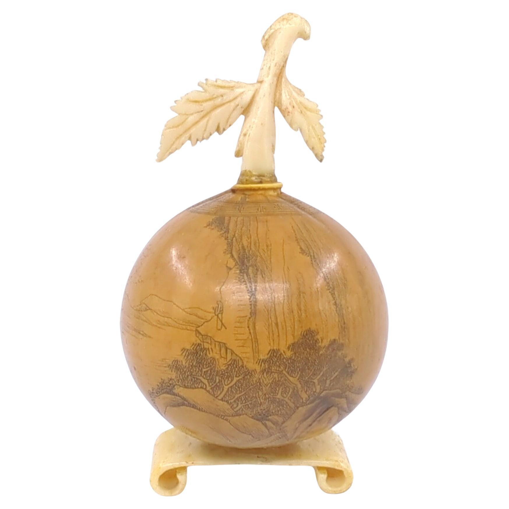 A masterfully carved hulu gourd snuff bottle by the esteemed artist Ruan Guang Yu (阮光宇, 1903-1960), a seminal figure in the realm of gourd carving. Originating as a folk painter from Hebei Province, Ruan moved to Lanzhou in 1938, where he began to