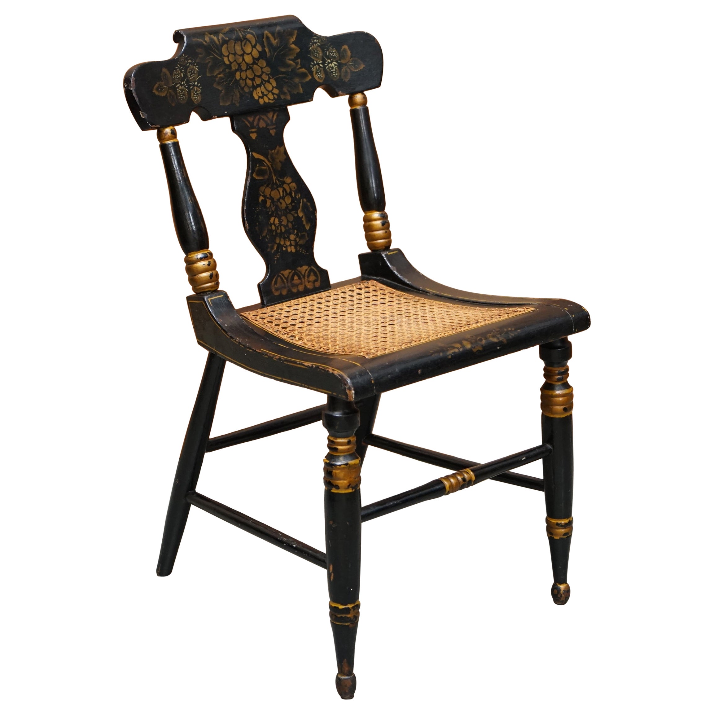 Importante sedia laterale Bergere di Baltimora, del 1825 circa, dipinta in ebano e dorata