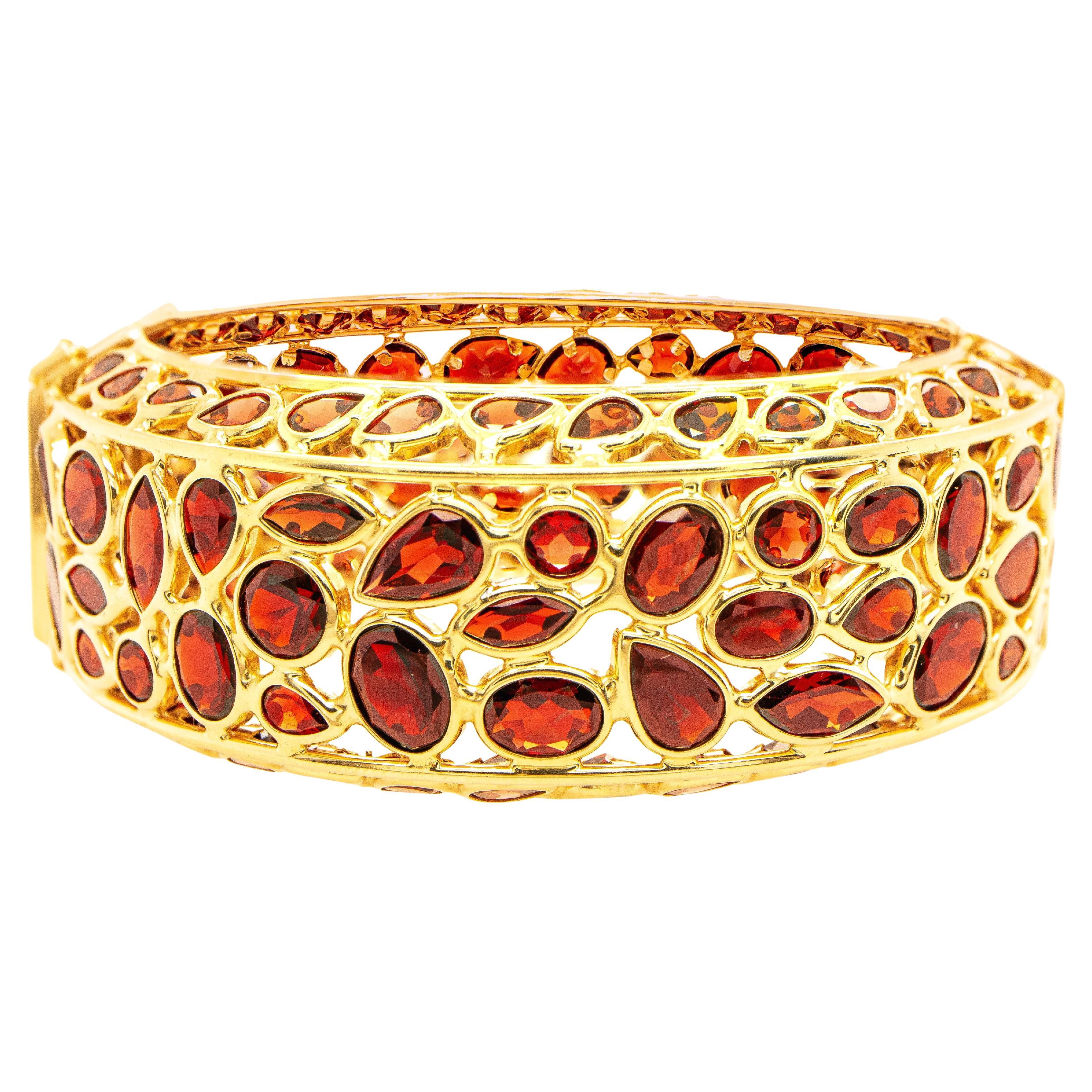 Important Cougar Bangle Bracelet Red Garnets 100 Carats 14K Yellow Gold For Sale