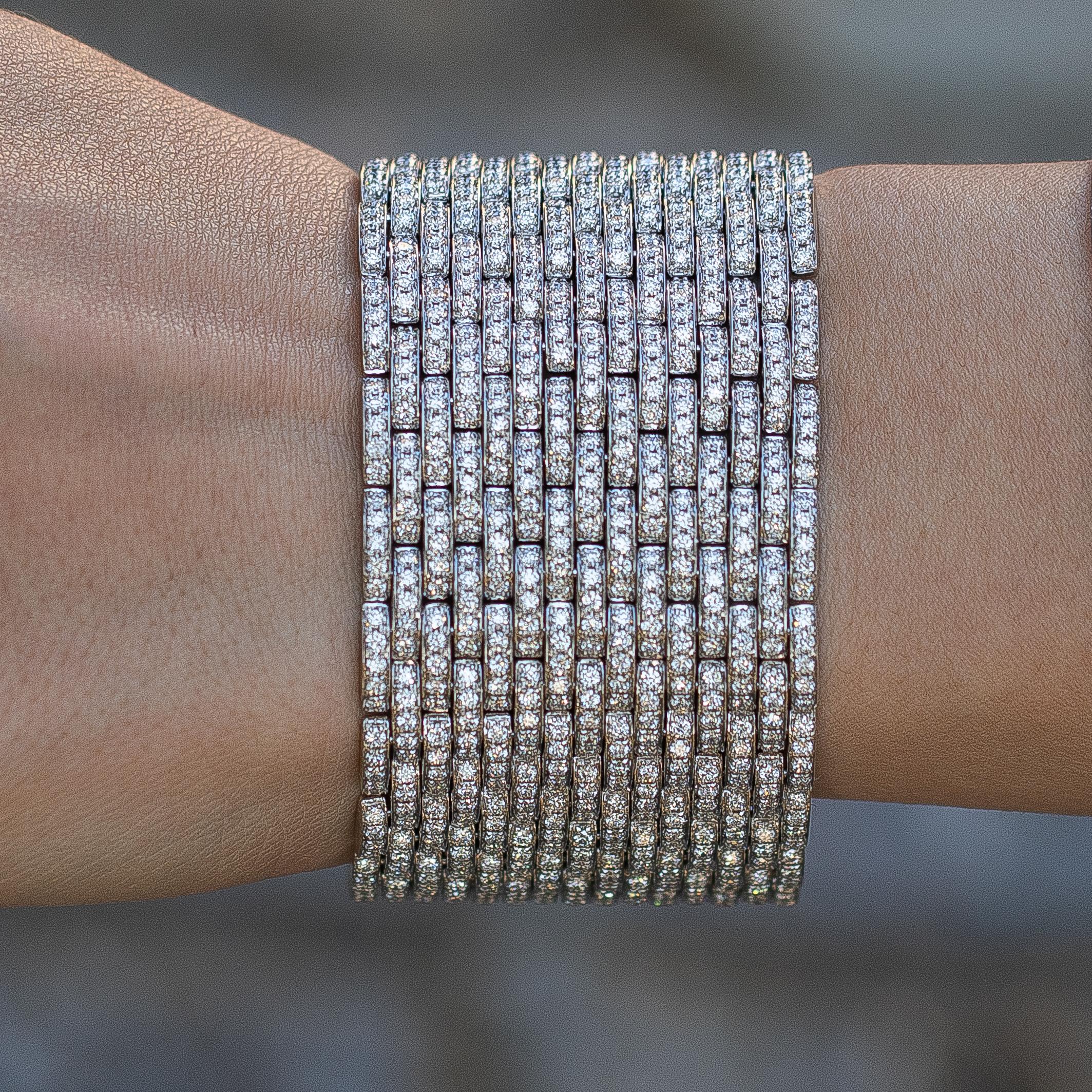 This beautiful hand-made bracelet adorns the wrist with sensuality in its subtle movements. Easily the finishing touch you need for any occasion.

1445 Diamonds
24.5 Carats
( Color: F, Clarity: VS )

18K White Gold
Length = 7 Inches
Jewelry Gift Box