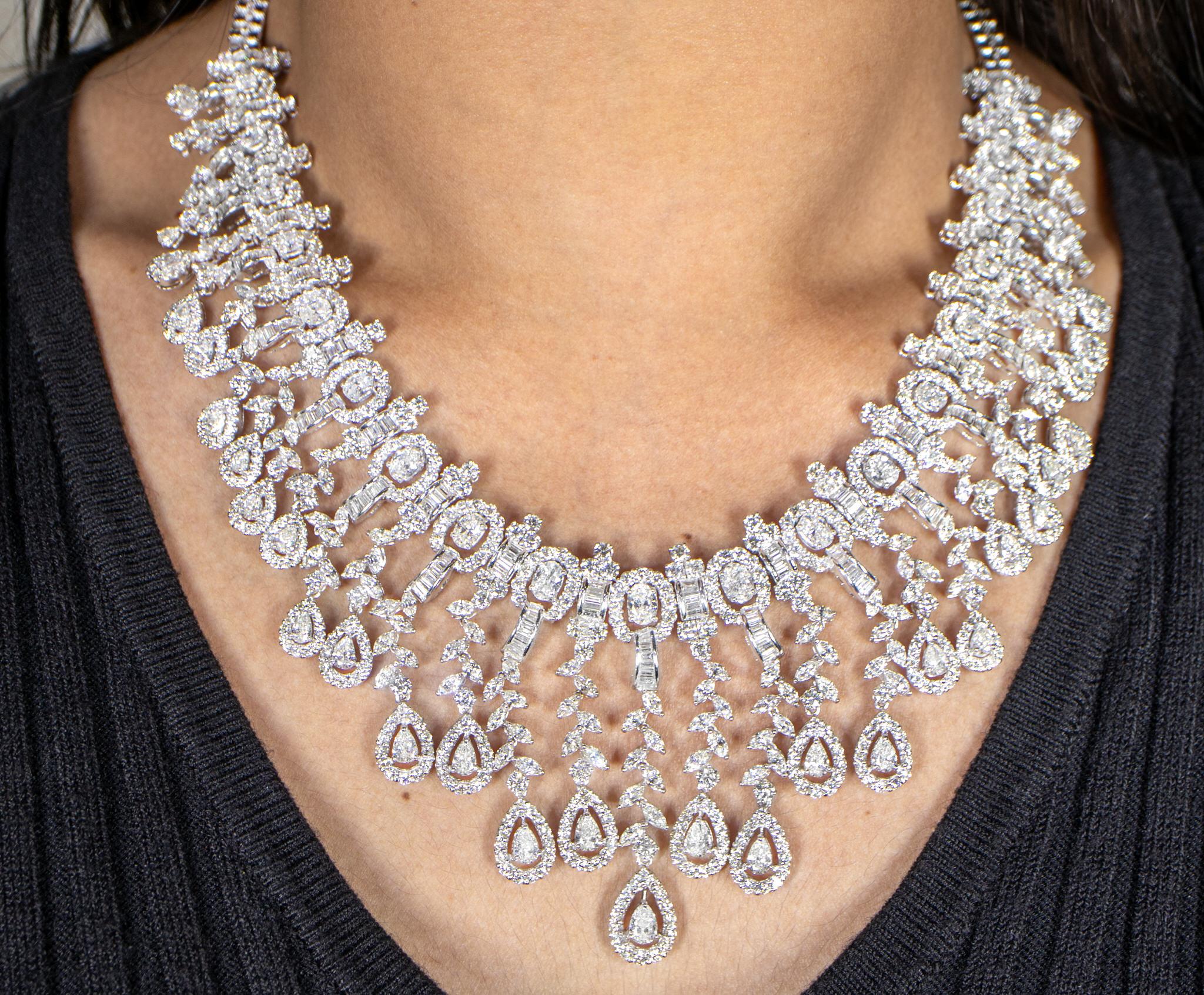 It comes with the Gemological Appraisal by GIA GG/AJP
All Diamonds are Natural
Diamonds = 48.00 Carats
Clarity: E-G; Clarity: VVS-SI
Metal: 18K White Gold
Necklace Length: 17 inches
Necklace Width: 2.26 inches
