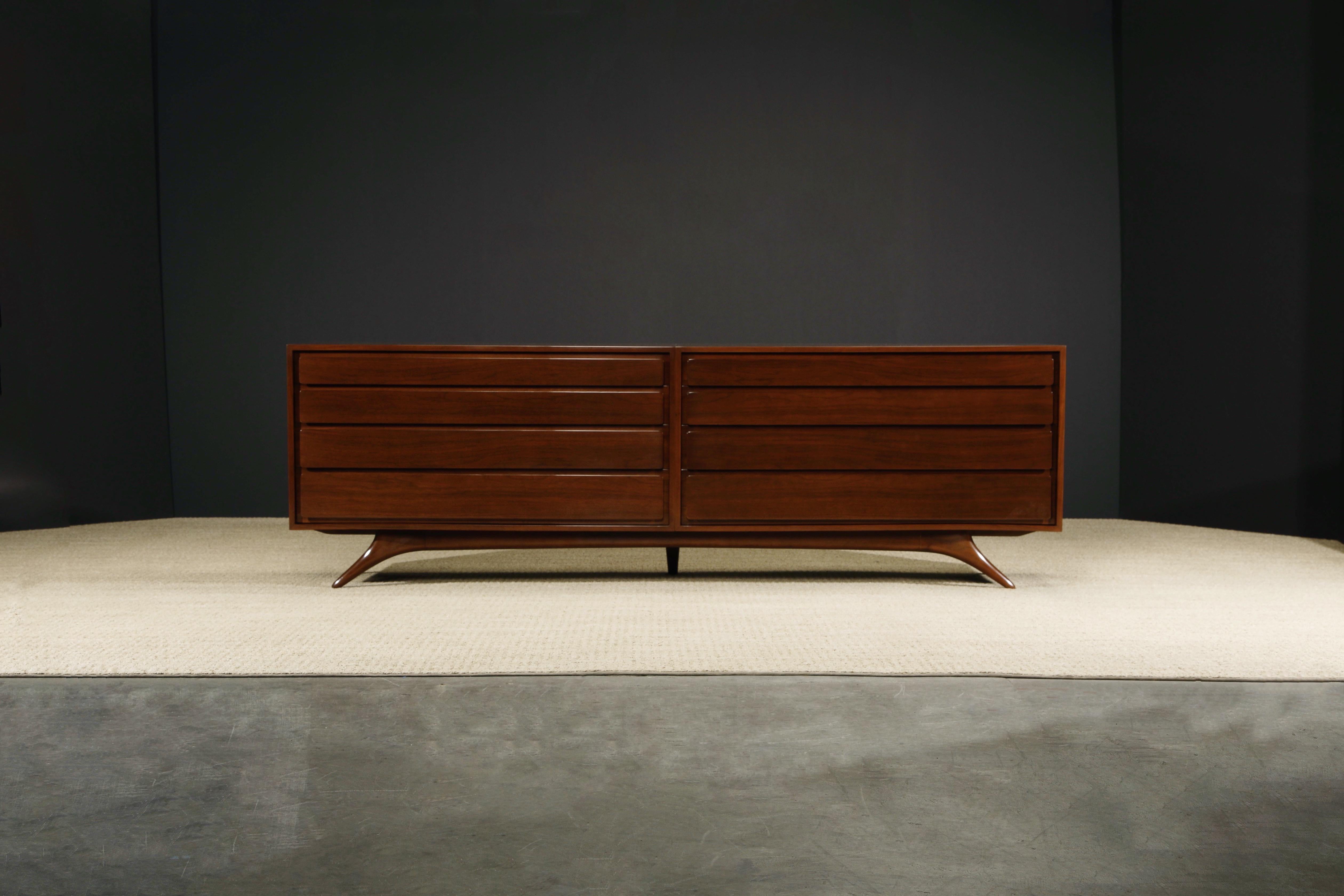 This very rare and important sculptural double dresser was designed by Vladimir Kagan and handcrafted by Kagan-Dreyfuss Inc during the 1950s in New York. Each of the two chests are signed on the back with Kagan-Dreyfuss New York stamps. Expansive