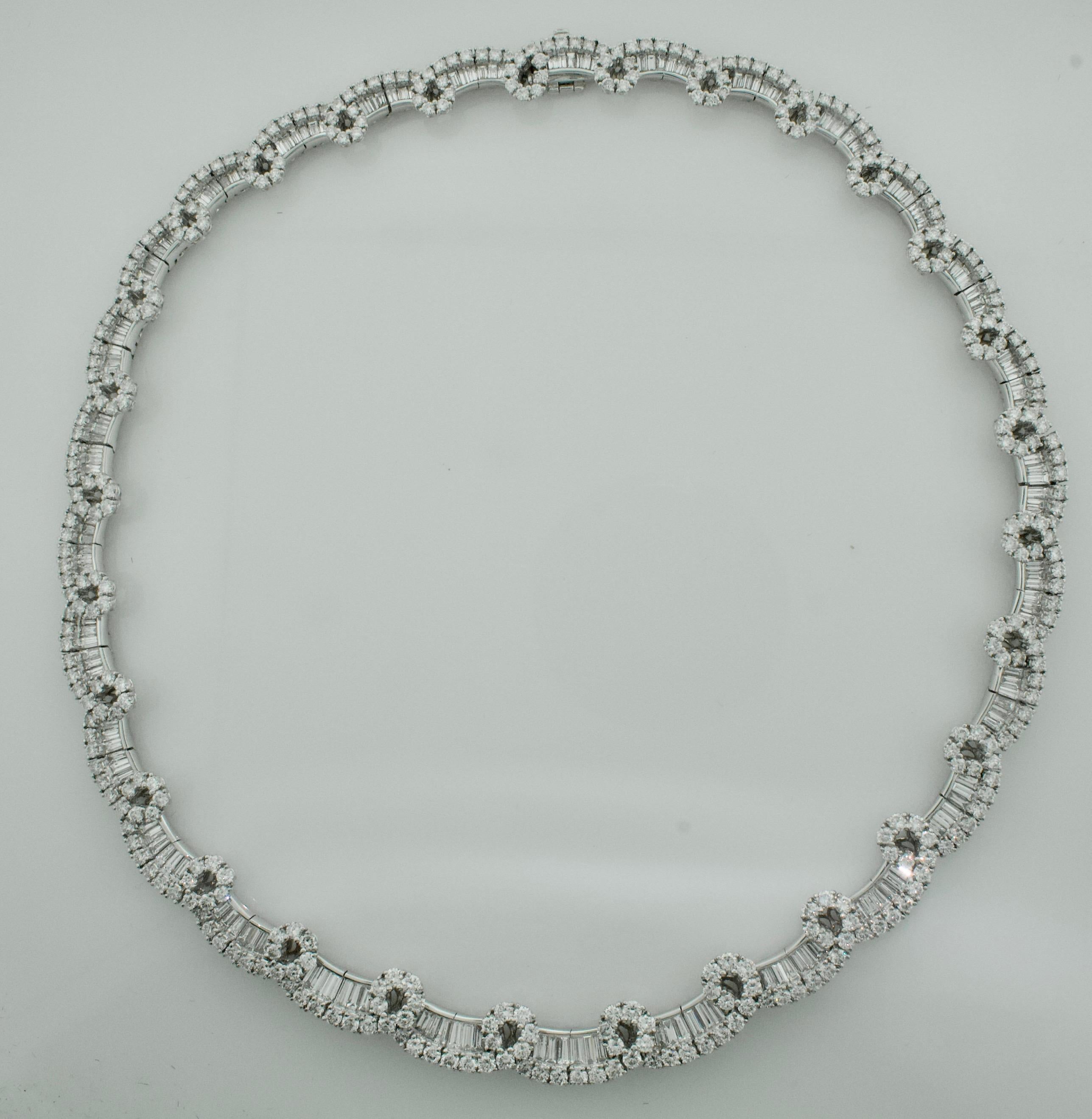 Important Dynamic Diamond Necklace in Platinum 24.07 carats
Five Hundred and Fifty One Round Brilliant and Baguette Cut Diamonds Weighing 24.07 Carats [GHI - VVS - SI] [bright with no imperfections visible to the naked eye]
Very Very Comfortable 
