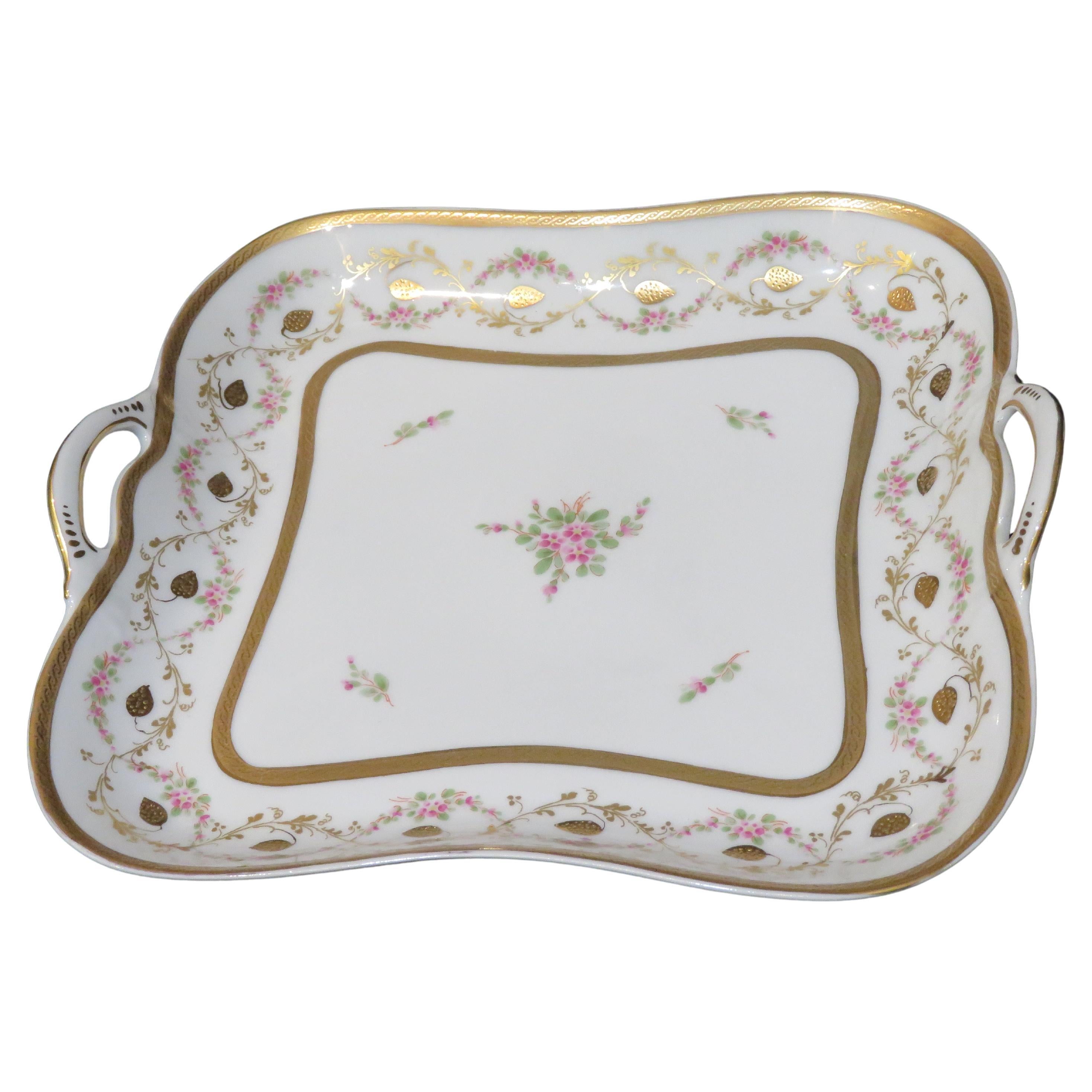 Importante bandeja grande de porcelana de Limoges de principios de 1900 con motivos florales en pan de oro