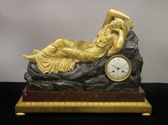 Important Early 19th Century Bronze Figural Mantle Clock of Recumbent Cleopatra