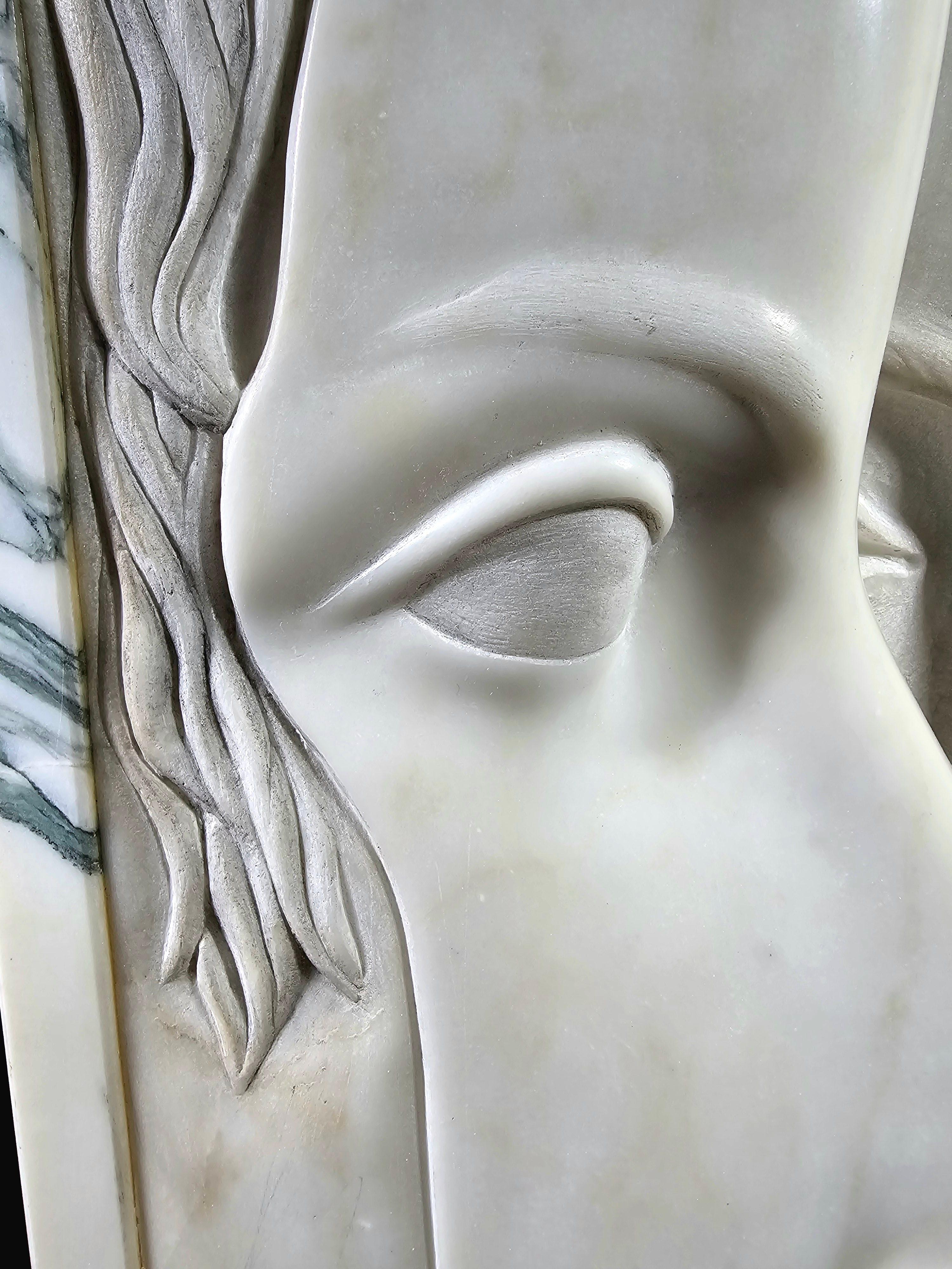 Presenting an extraordinary early 20th-century Art Deco sculpture, masterfully carved entirely from premium Carrara white marble and Calacatta marble, known as the most expensive marble in the world. This unique piece, depicting The Three Graces,