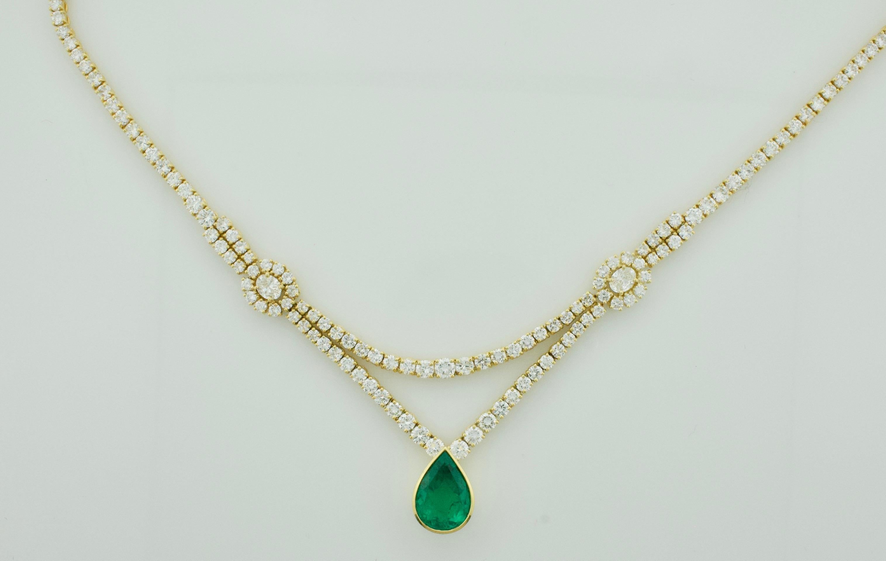 Indulge in timeless elegance with our exquisite Important Emerald and Diamond Necklace crafted in luxurious 18k Yellow Gold. This stunning piece features a majestic Pear Shape Emerald, boasting a weight of approximately 6.00 carats. Renowned for its