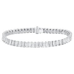 Importante bracciale tennis con diamanti taglio smeraldo 20,32 carati 51 diamanti oro 18 carati