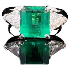 Important Emerald Cut Emerald Diamond Platinum Three-Stone Ring