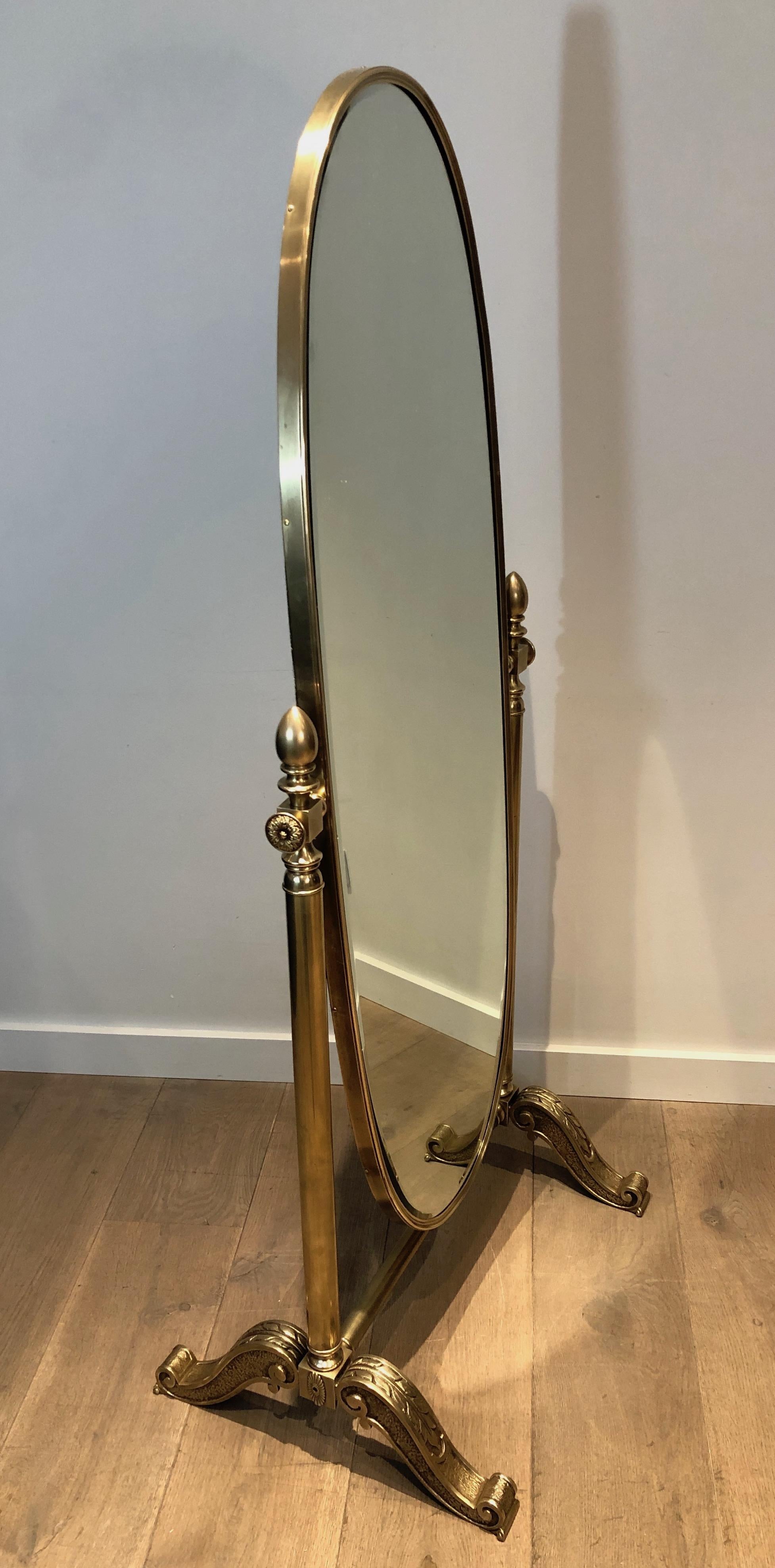 This important Empire style Psyche mirror is made of bronze and brass. This is a French work, circa 1880.