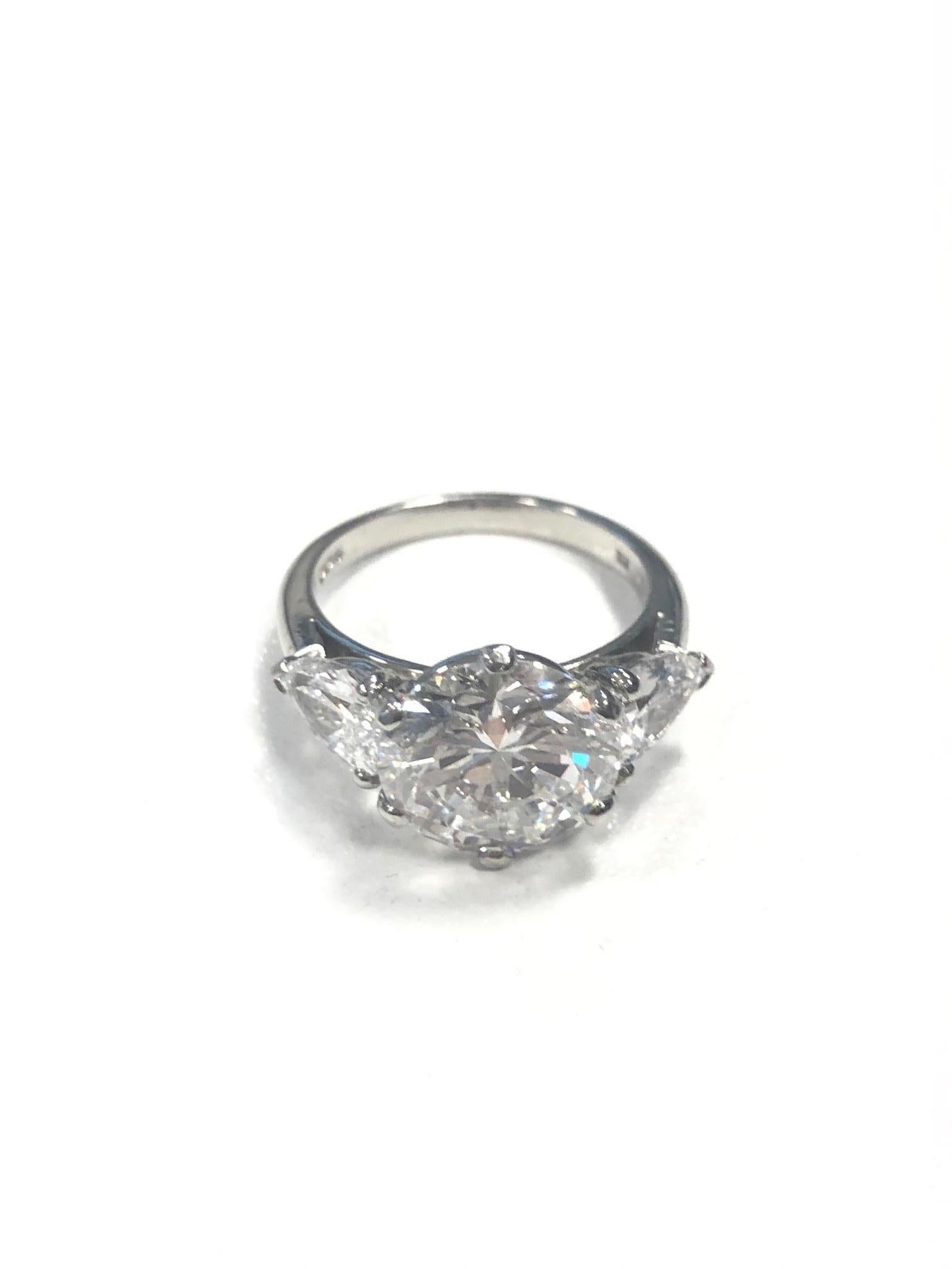 A Highly Important  Diamond Ring signed Cartier, London.
Mounted in 18K White Gold and set with a magnficent Round-Brilliant cut diamond weighing 4.48cts, certified by International GIA Laboratory stating the colour as E and clarity Internally