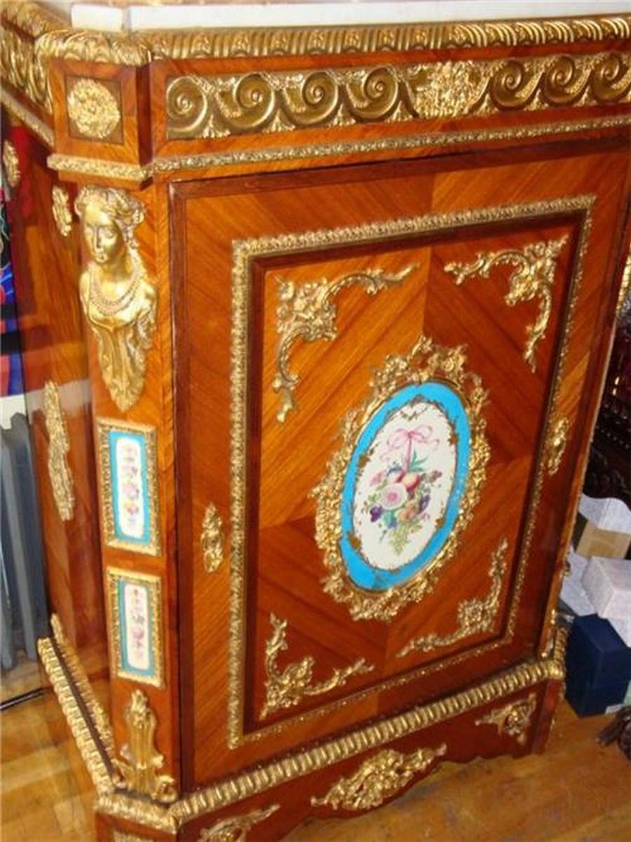 The Following Item we are offering is An Outstanding Museum Quality 19th Century Napoleon III Ormolu and Sevres  Porcelain- Mounted Tulipwood and Mahogany Commode

A Similar One of this Make is Featured in Chateau de Versailles, France.

The