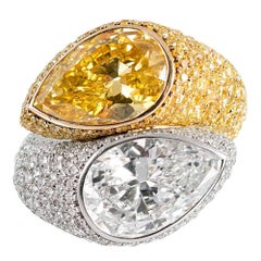 Important Fancy Vivid Yellow and White Diamond Bypass Ring