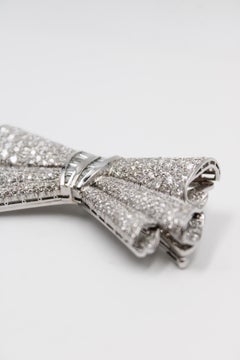Important French 1950s Diamond Bow Brooch in Platinum and White Gold