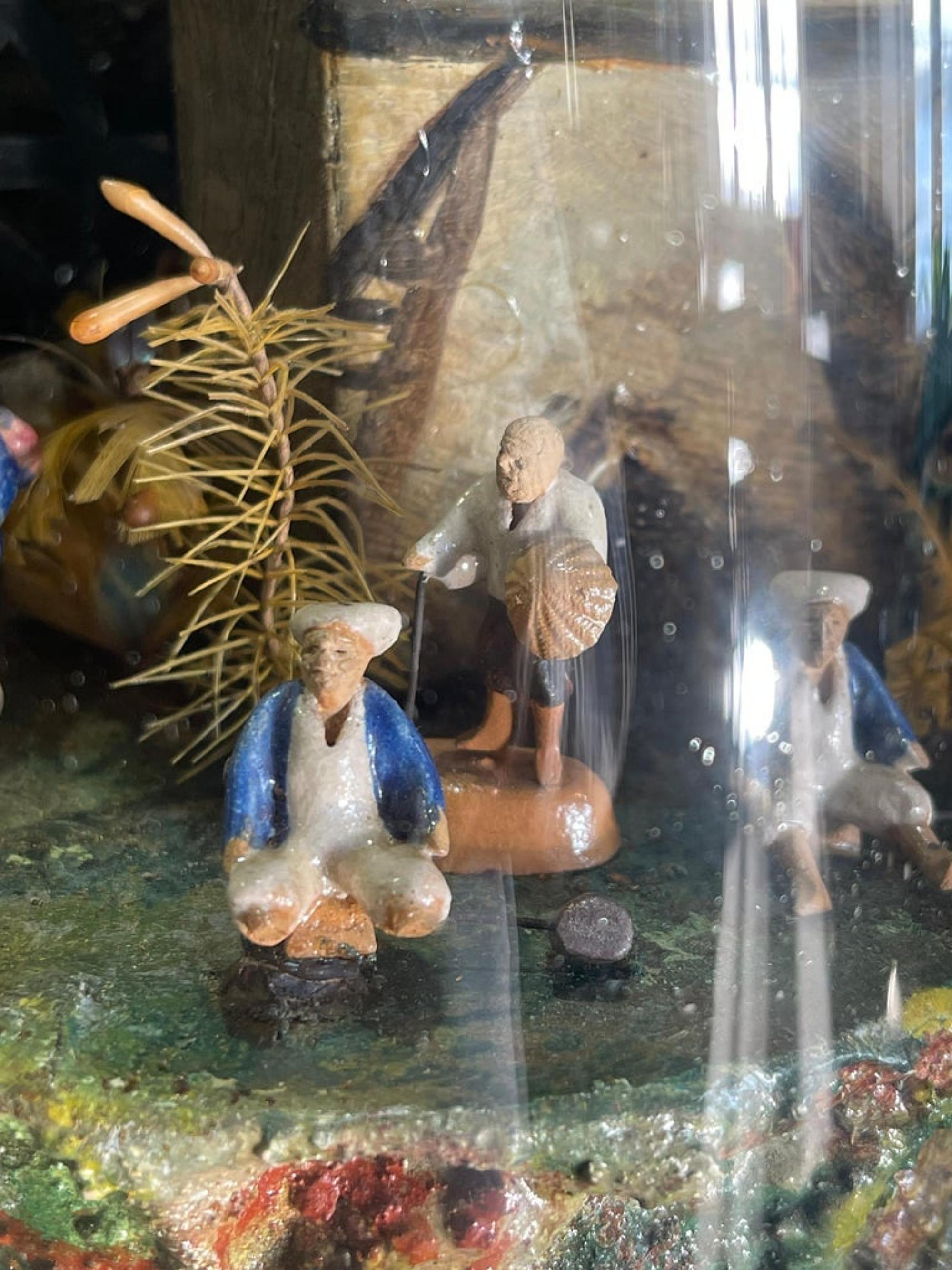 Important French Automaton
circa 1880 representing river scenery with boat, train, rural houses and animals. In various materials, glass dome with wooden base.
On the move.
Dim.: 47 x 44 x 19 cm
Good conditions.
