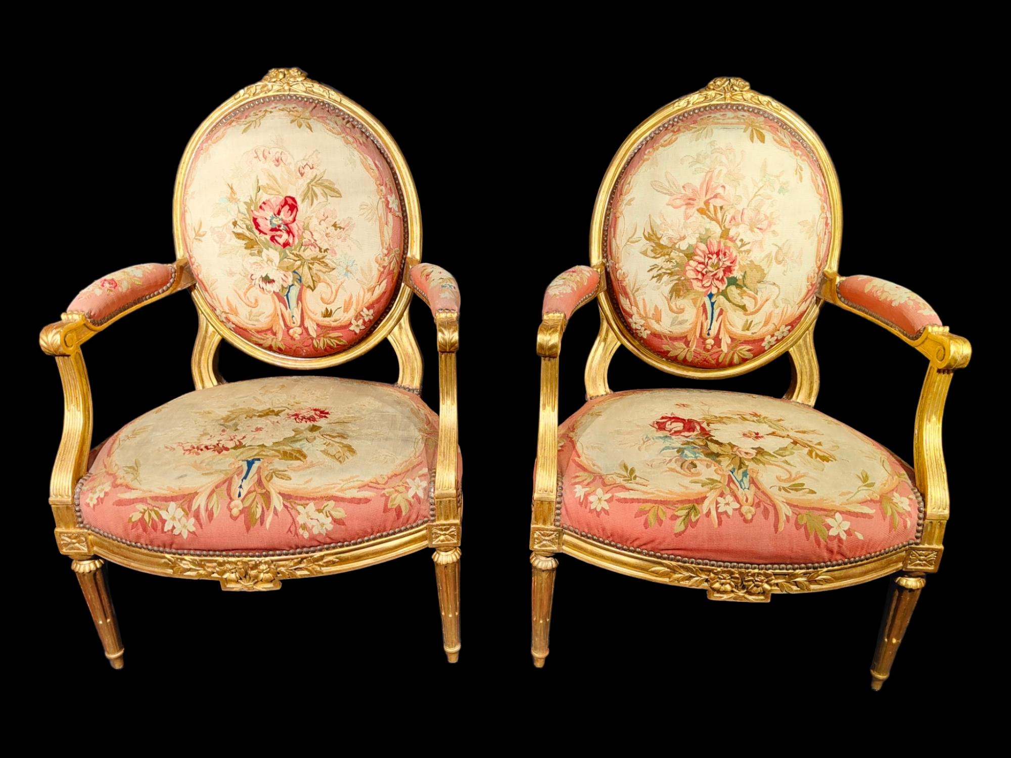 A PAIR OF LOUIS XVI GILTWOOD SEATS,BY CLAUDE CHEVIGNY, CIRCA 1775-80.
A PAIR OF LOUIS XVI GILTWOOD SEATS,BY CLAUDE CHEVIGNY, CIRCA 1775-80.
Both covered in original Beauvais tapestry covers retaining strong original colouring and woven with