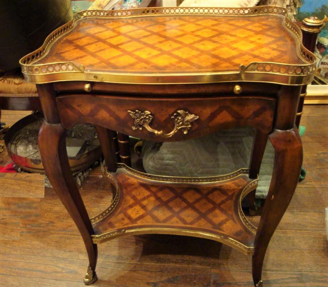 The Following Item we are offering is A Magnificent Museum Quality Important Inlaid  Mahogany Wooden Console Side / Foyer Table. Beautiful Bronze Scrolling Throughout. Beautifully done with Exquisite Parquet Detail. Has Storage Drawer Compartment