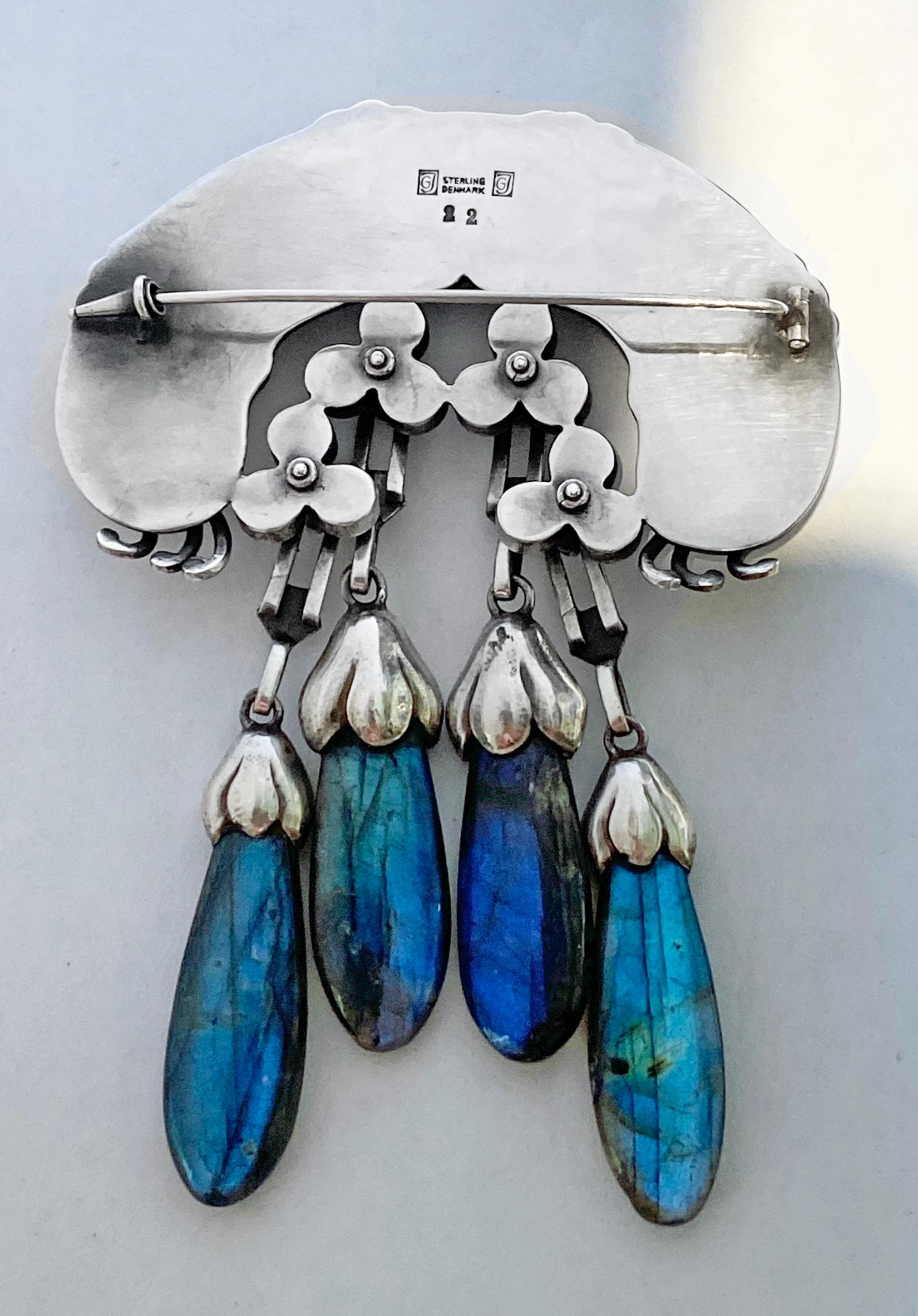 Important Georg Jensen Large rare Silver Labradorite Master Brooch, C.1933.  Georg Jensen. Designed as elaborate foliate and bud motifs set with and suspending labradorite cabochons and drops, no. 12, 11.0 x 7.5 cm, signed GJ in box 925S Sterling