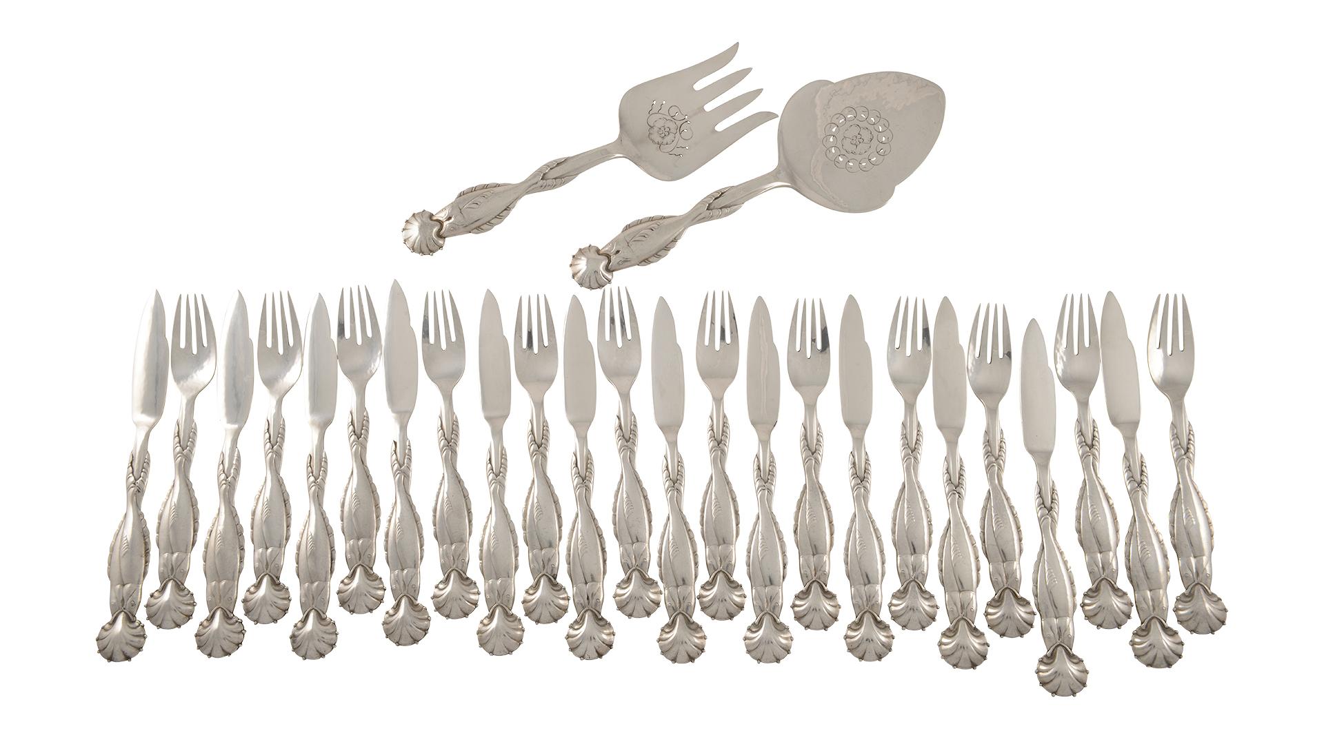 An important and extensive 260-piece Georg Jensen silverware service for twelve in the Acorn and #55 pattern.

Georg Jensen Acorn:

12 dinner knives short handle, 9? (23cm) stainless steel blades
12 dinner forks, 7 7/16? (19cm)
12 round soup spoons,