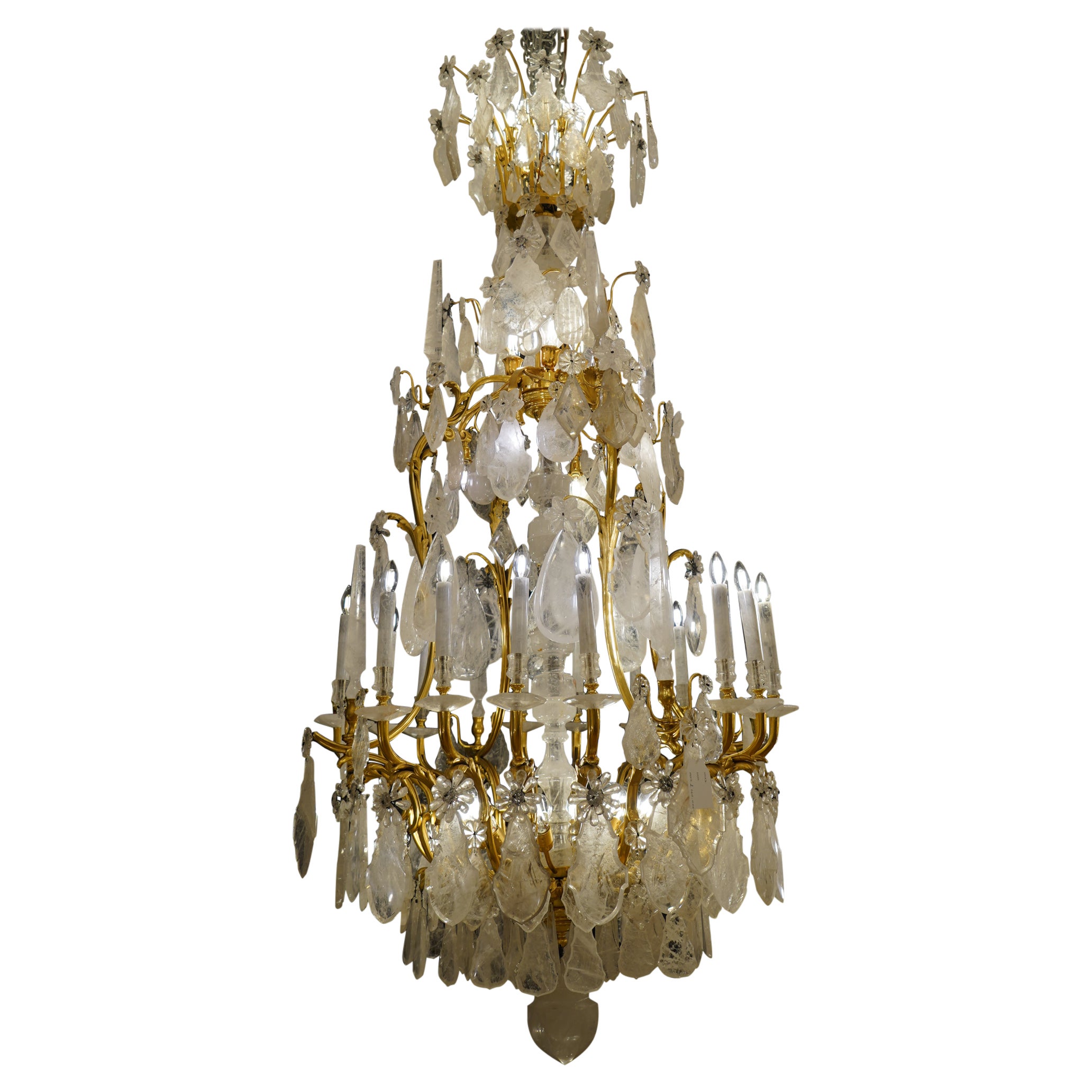 Importante lampadario francese in cristallo di rocca e bronzo dorato di Georges Hoentschel