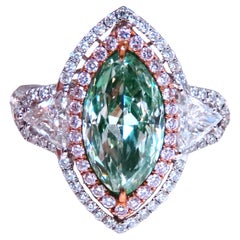 Importante anello con diamante verde naturale certificato GIA da 3,06 carati, in oro 18 carati, Halo 12624