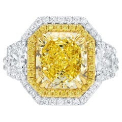 Importante anillo de diamantes amarillos de fantasía naturales certificados por el GIA de 5,15 quilates y oro de 18 quilates
