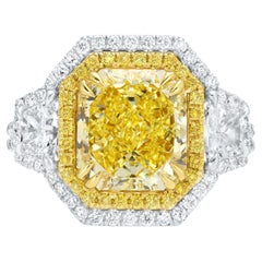 Importante bague en or 18 carats avec diamant jaune fantaisie naturel certifié GIA de 5,15 carats