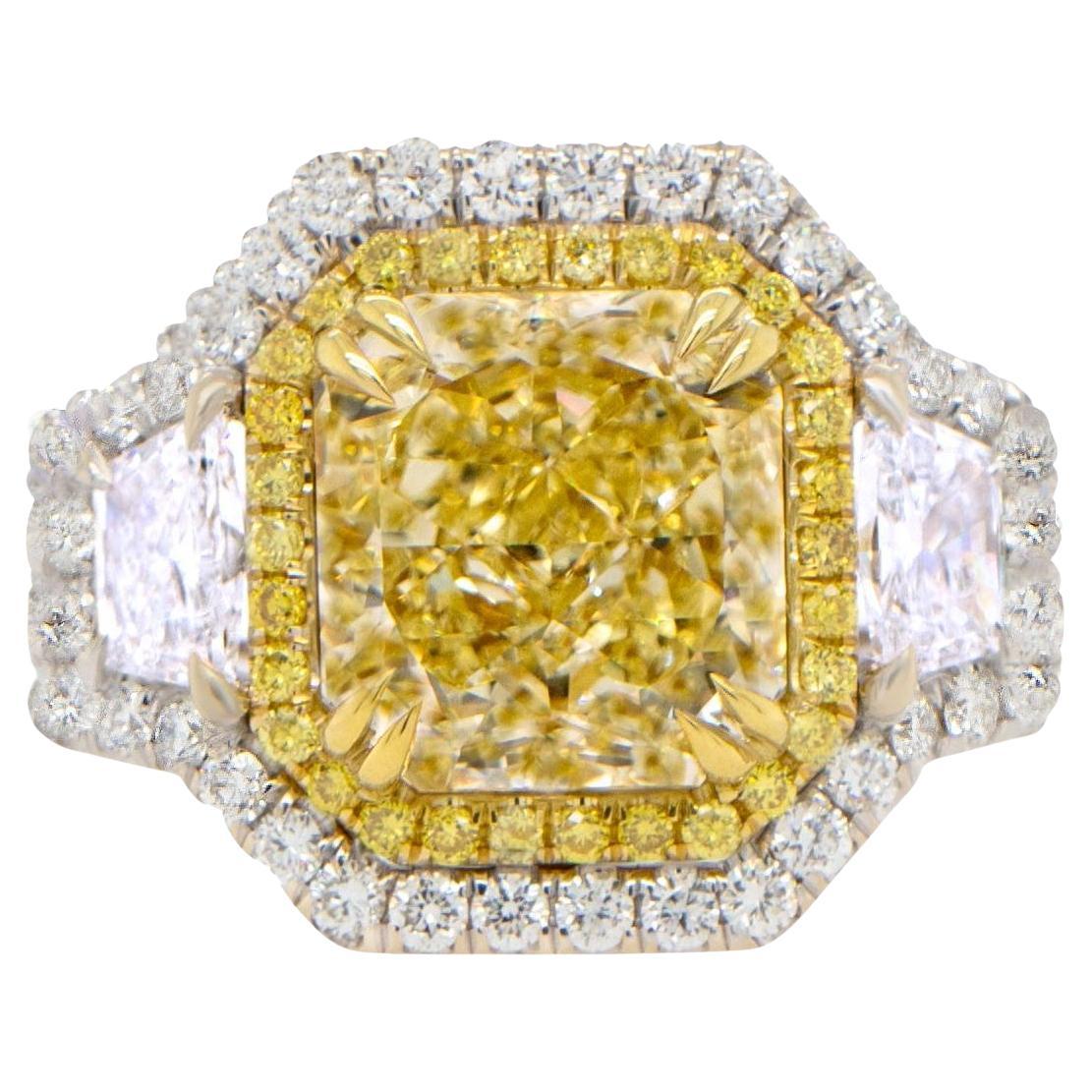 Importante bague en or 18 carats avec diamant jaune fantaisie naturel certifié GIA de 5,23 carats