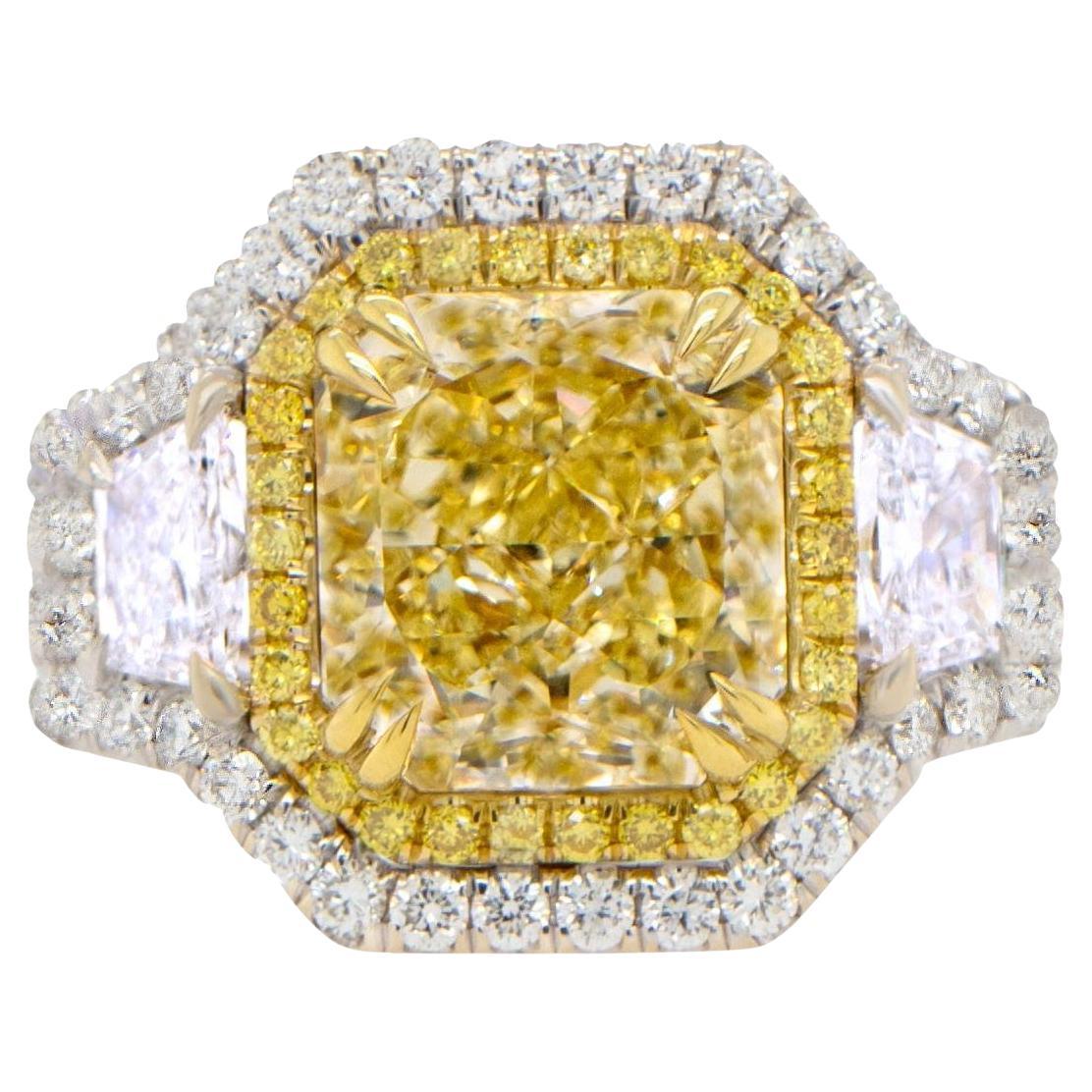 Important GIA Certified Natural Fancy Yellow Diamond Ring 5.23 Carats 18K Gold For Sale
