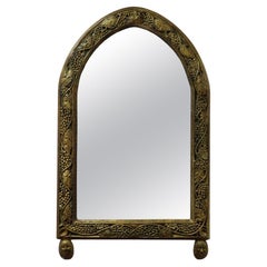 Importante specchio in legno dorato, XX secolo.