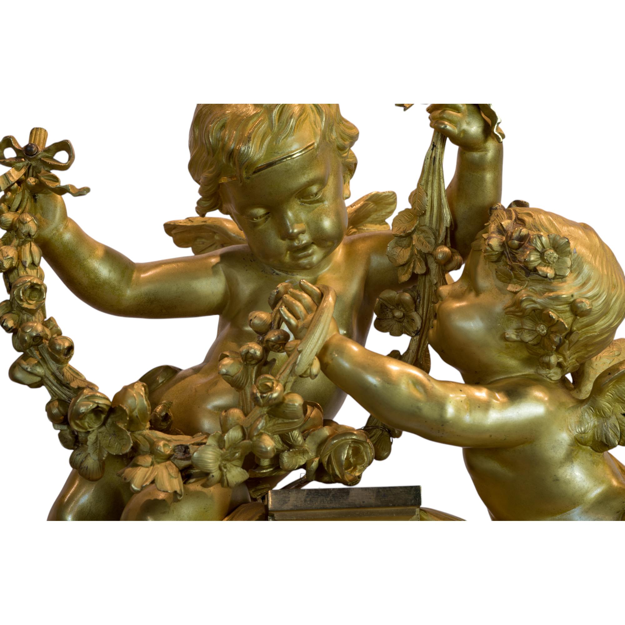 French Important Gilt Bronze Clockset by Raingo Frères For Sale