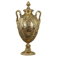 Important gilt bronze ovoid-shaped covered vase