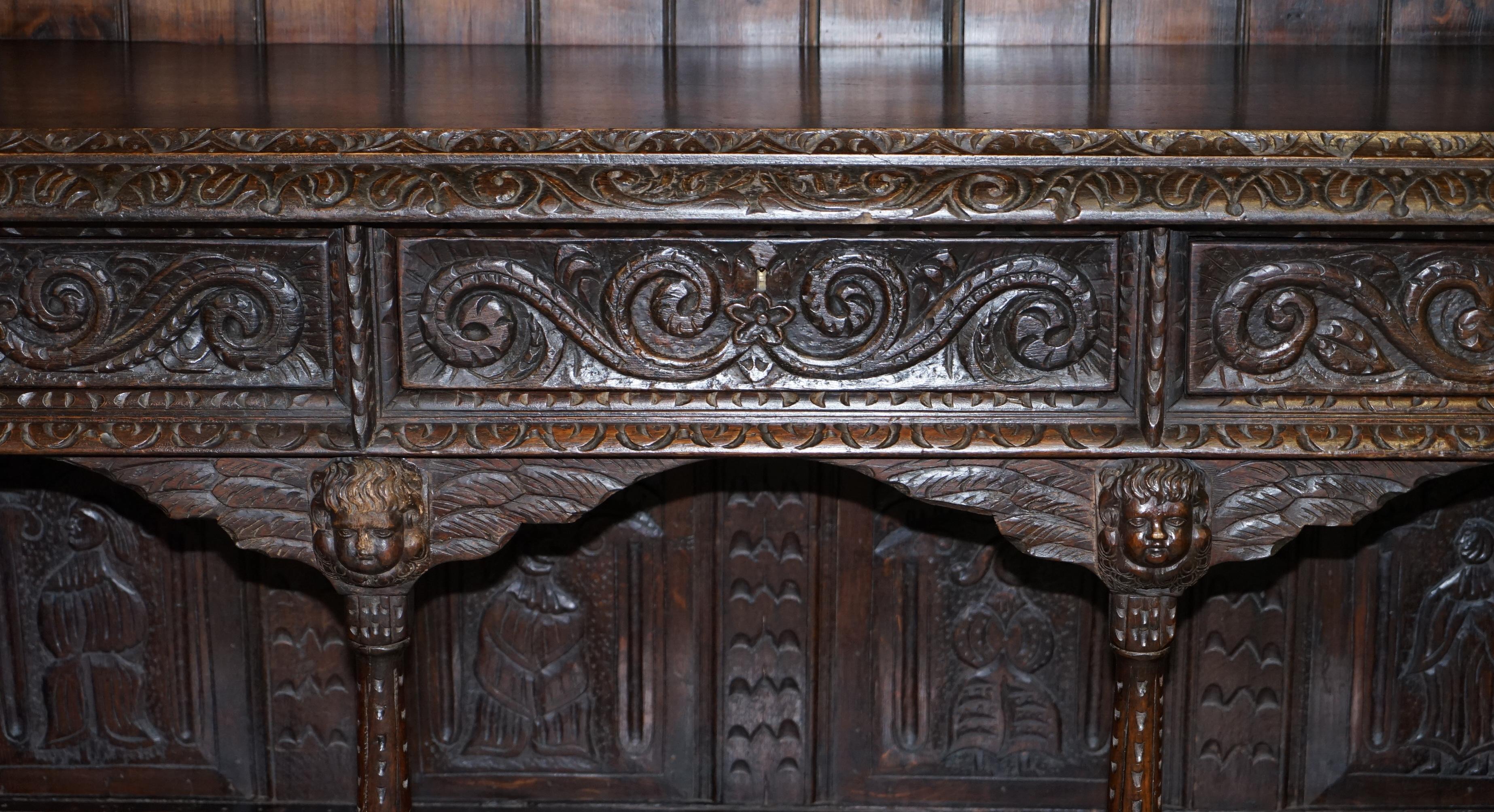 Important Gothic Revival Using 17th Century Panels Bookcase Dresser Cherubs For Sale 1