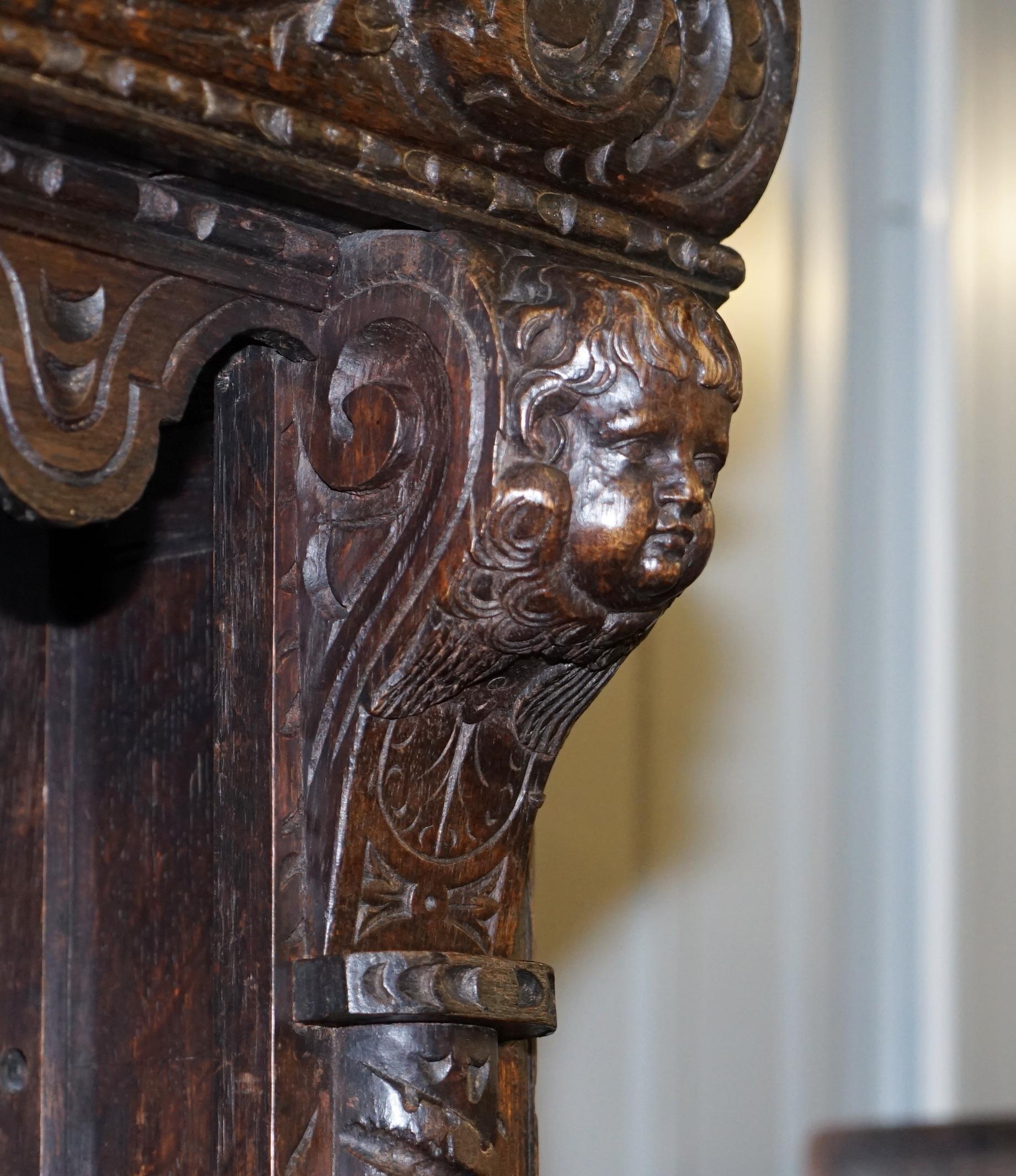 Important Gothic Revival Using 17th Century Panels Bookcase Dresser Cherubs For Sale 5