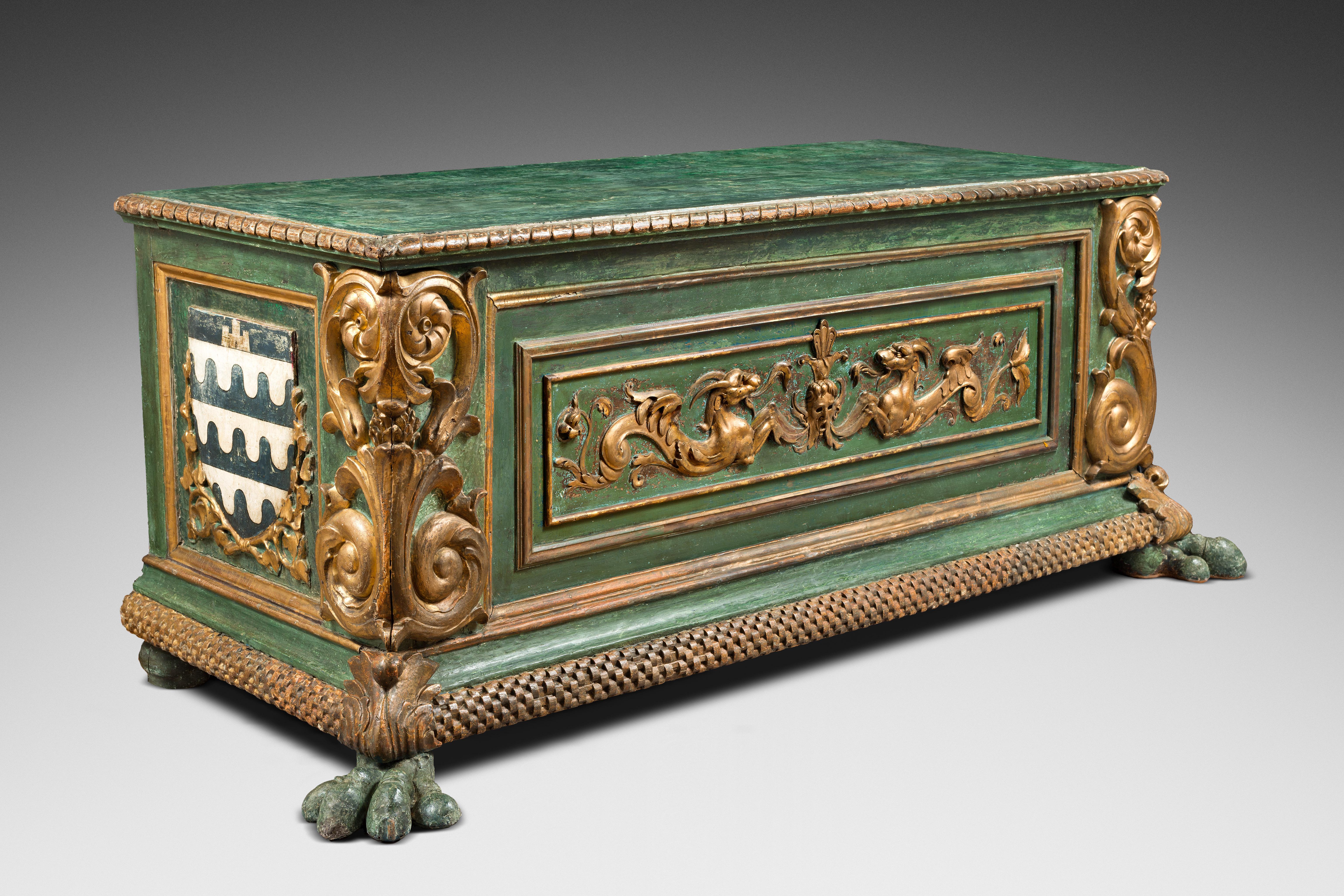 Important Italian Renaissance Polychrome chest with coat-of-arms

Origin: Italy
Period: early 16th century

Height: 71cm
Length: 190cm
Depth: 78cm

Polychrome wood
Partly original

This large and strong chest stands on two vigorous lion