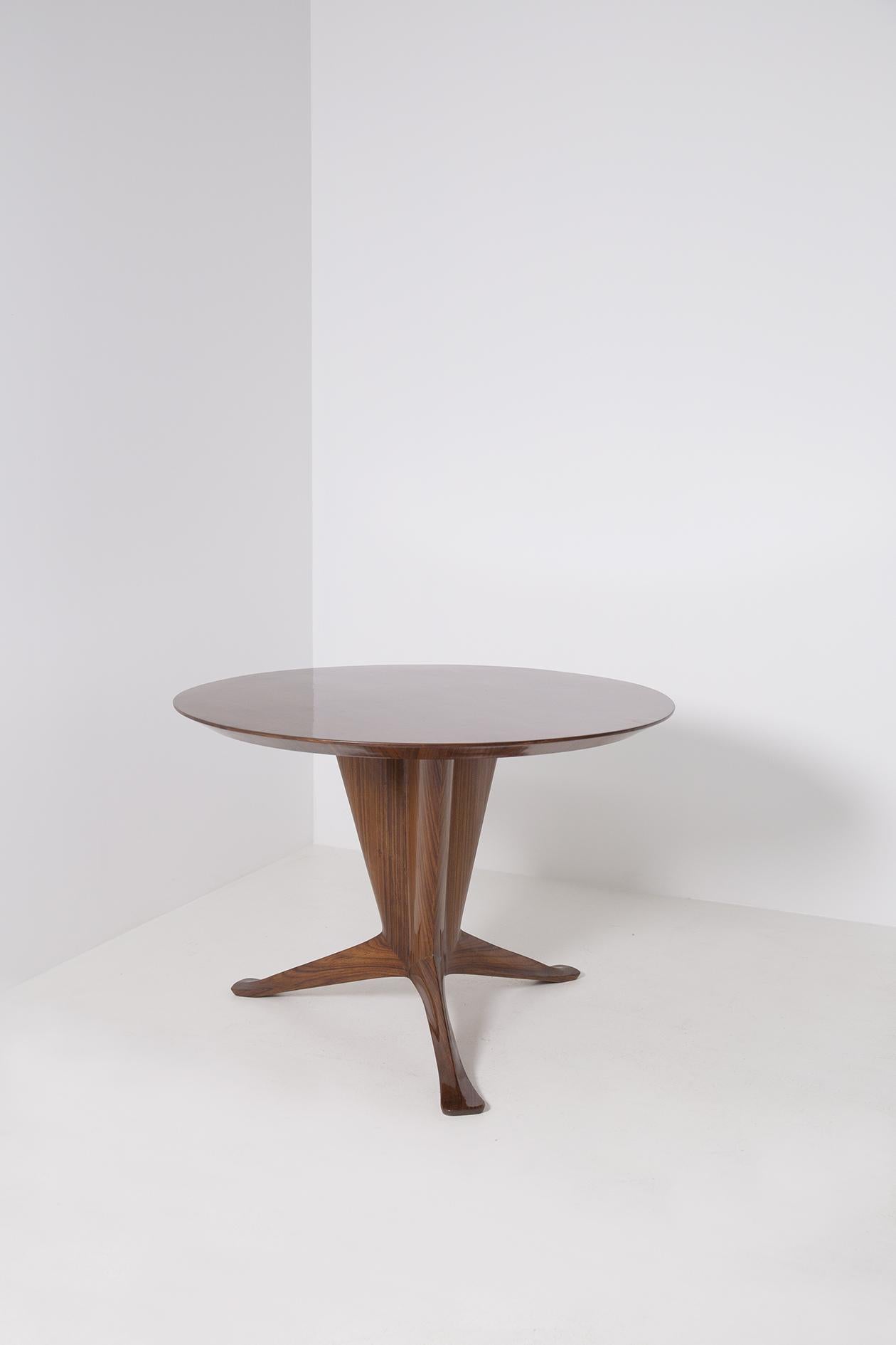 Important Italian table designed by the great designer Ico Parisi, from 1949. The table was designed by Ico Parisi and executed by Fratelli Rizzi Intimiano - Italy, for a private home. The dining table is a single piece that exists and has been