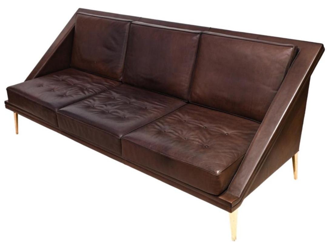 Charles Ramos, rare, leather sofa on gilded aluminum legs. Minimal, elegant, graceful and yet comfortable. Made in France around 1958, a true, hard to find piece.
Coming from a cabinetmaker family, Charles Ramos was a self taught designer and