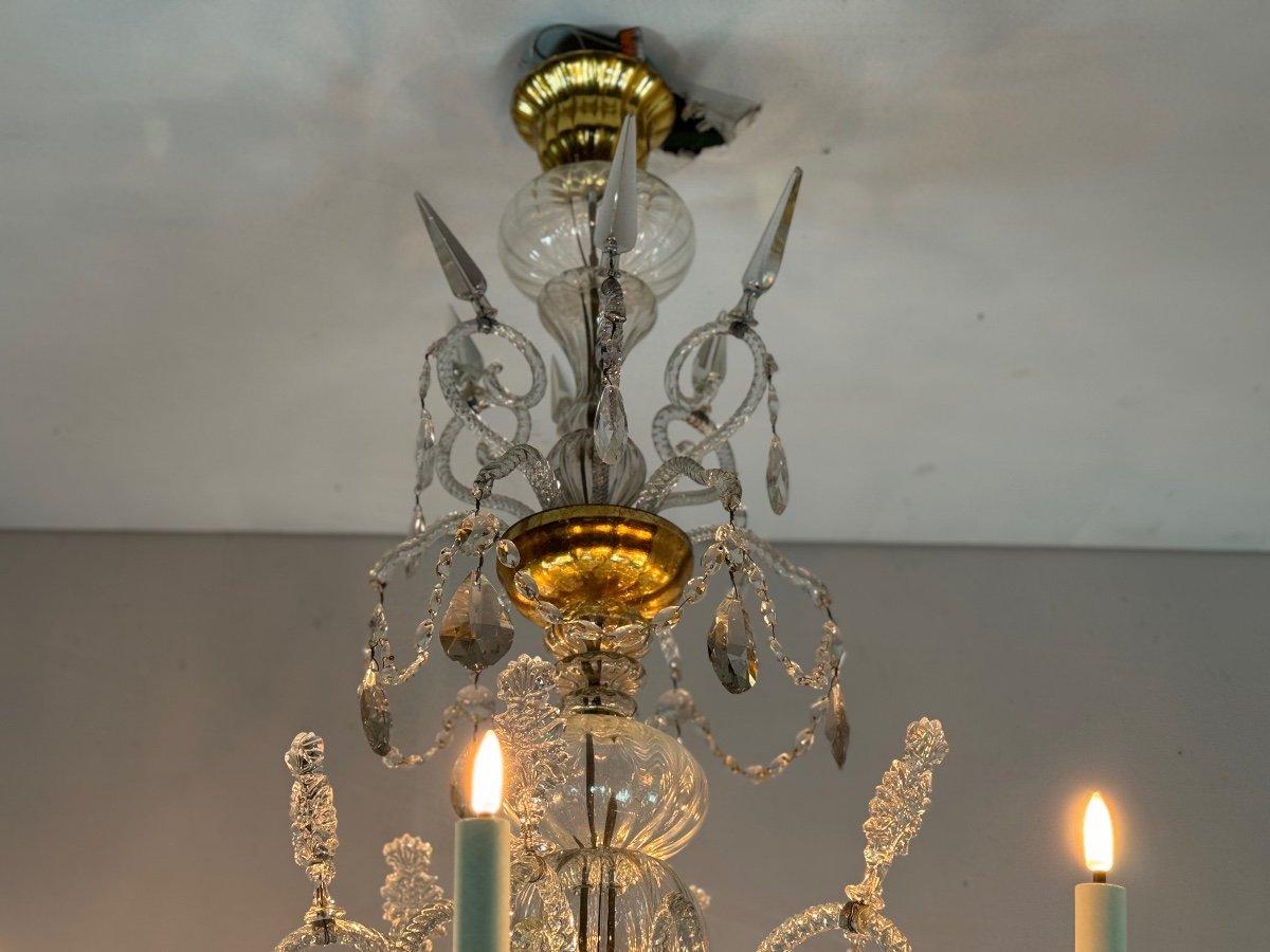 Important lustre Liégeois en verre soufflé et taillé, 18ème siècle 

Trois niveaux de pendentifs et 16 appliques sur deux niveaux