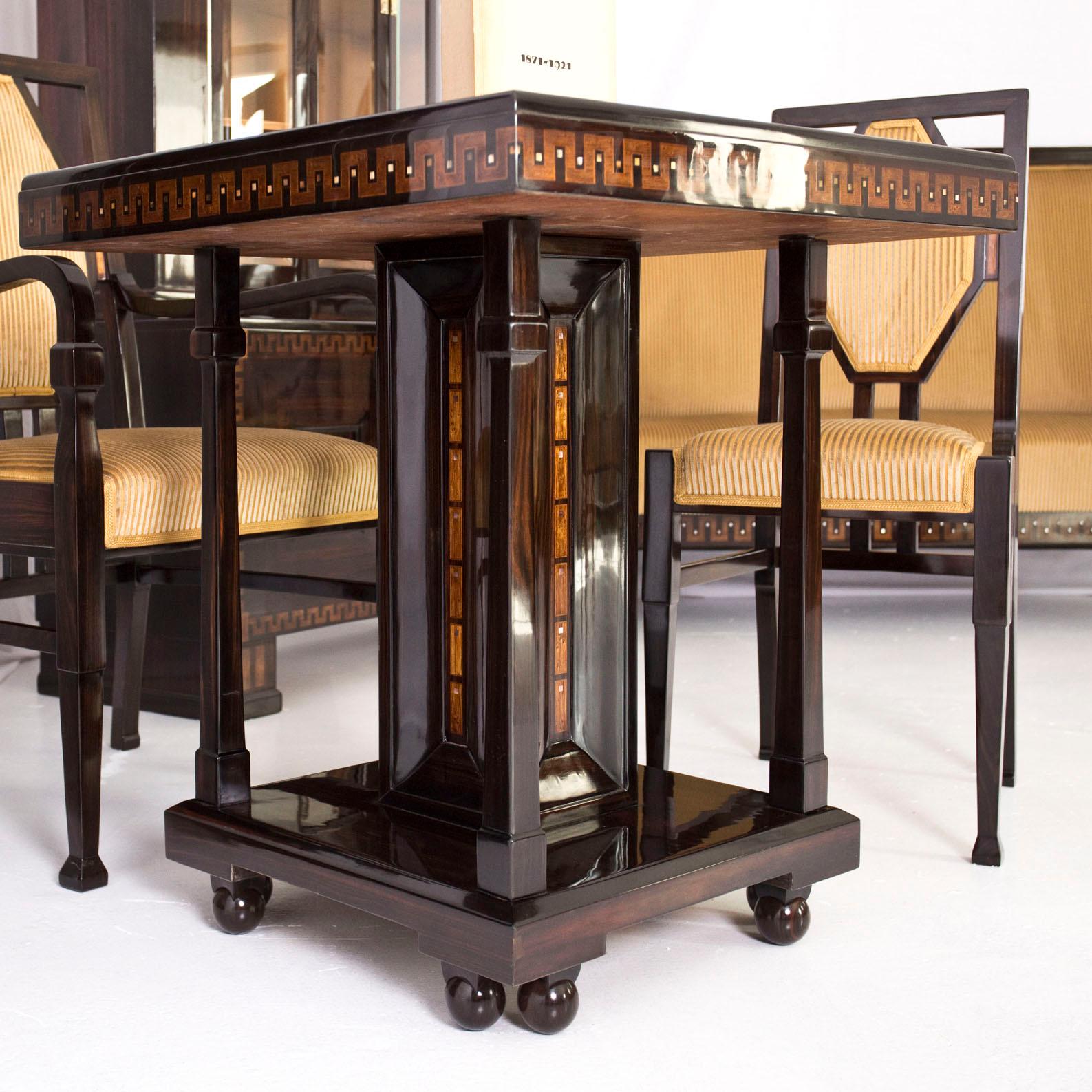 Exceptional and rare living room set composed by a table with four chairs, and sofà, a Book cabinet and Pedestal by Ludwig Alter, Darmstadt, Germany, 1908 circa.
Part of a living room ordered and executed in 1908 by Ludwig Alter for a noble family
