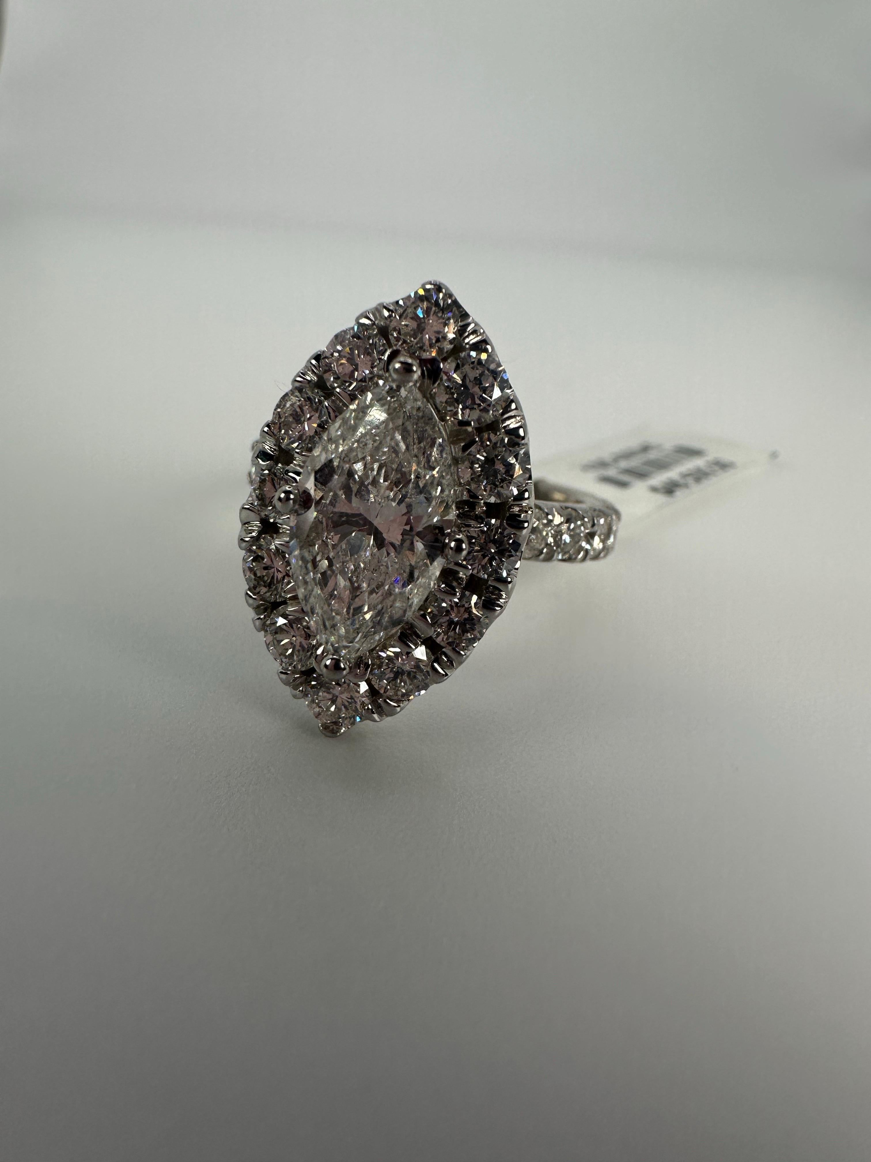 Marquise Diamant Verlobungsring in 14KT Gold mit 1,80 Karat Zentrum F Farbe und I1 Klarheit und 1,70 Karat der umliegenden Diamanten. Dieser Ring ist gut gemacht! 

Kommt mit schöner Verpackung, Echtheitszertifikat und schnellem Versand!

WAS SIE