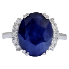 Importante anillo de zafiro azul natural engastado con diamantes 6,74 quilates Oro de 18 quilates