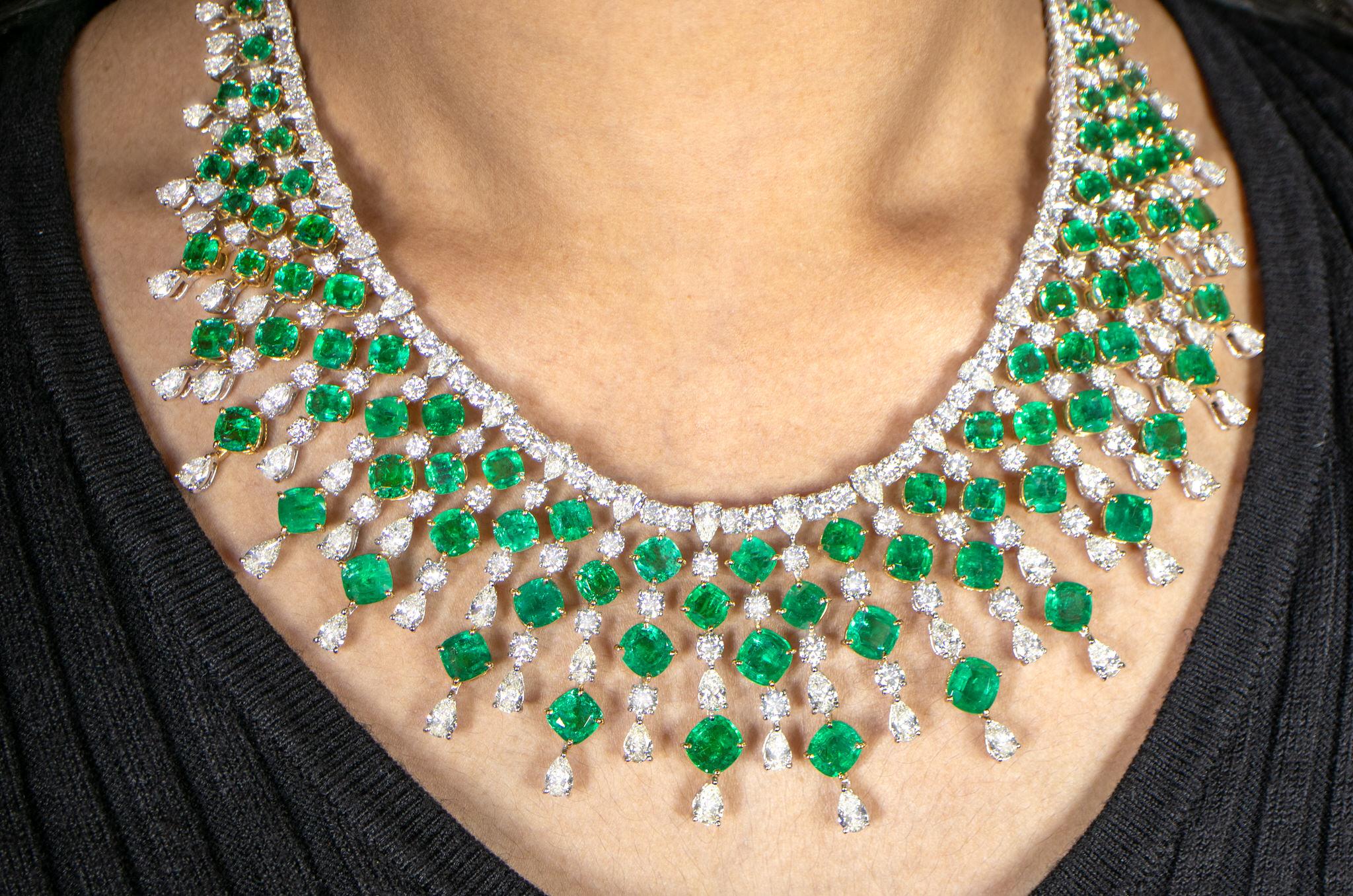 It comes with the Gemological Appraisal by GIA GG/AJP
All Gemstones are Natural
Emeralds = 75.25 Carats
Diamonds = 44.85 Carats
Clarity: E-G; Clarity: VVS-SI
Metal: 18K Gold
Necklace Length: 18 inches
Necklace Drop: 2 inches