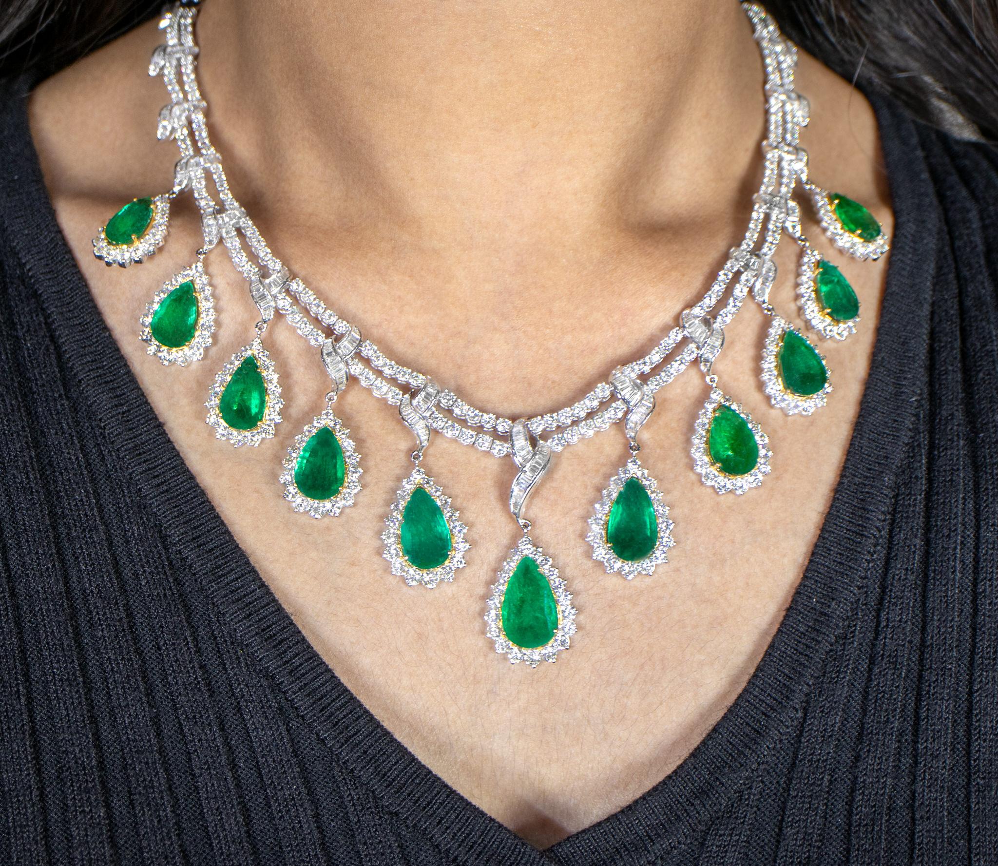 It comes with the Gemological Appraisal by GIA GG/AJP
All Gemstones are Natural
Emeralds = 43.10 Carats
Diamonds = 26.40 Carats
Clarity: E-G; Clarity: VVS-SI
Metal: 18K Gold
Necklace Length: 18 inches
Necklace Width: 1.88 inches
