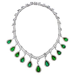 Important collier en or 18 carats, émeraudes et diamants 69 carats