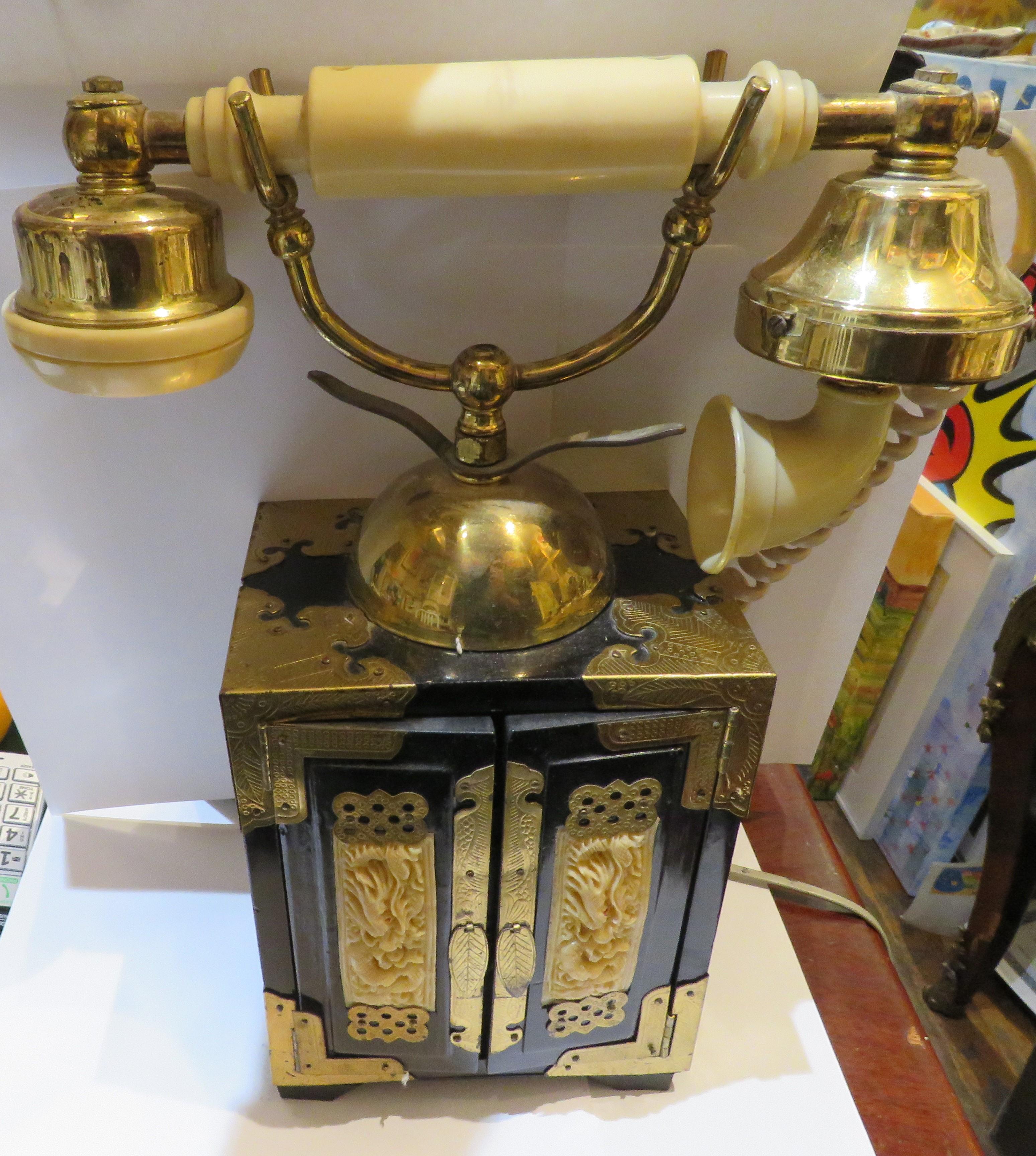The Following Item we are Offering is this Rare Vintage Antique Asian Rotary Desk Telephone Vitrine. Beautifully done with Fine Detail and Carvings.
Taken out of an Important Several Million Dollar Estate.

Measures: 12