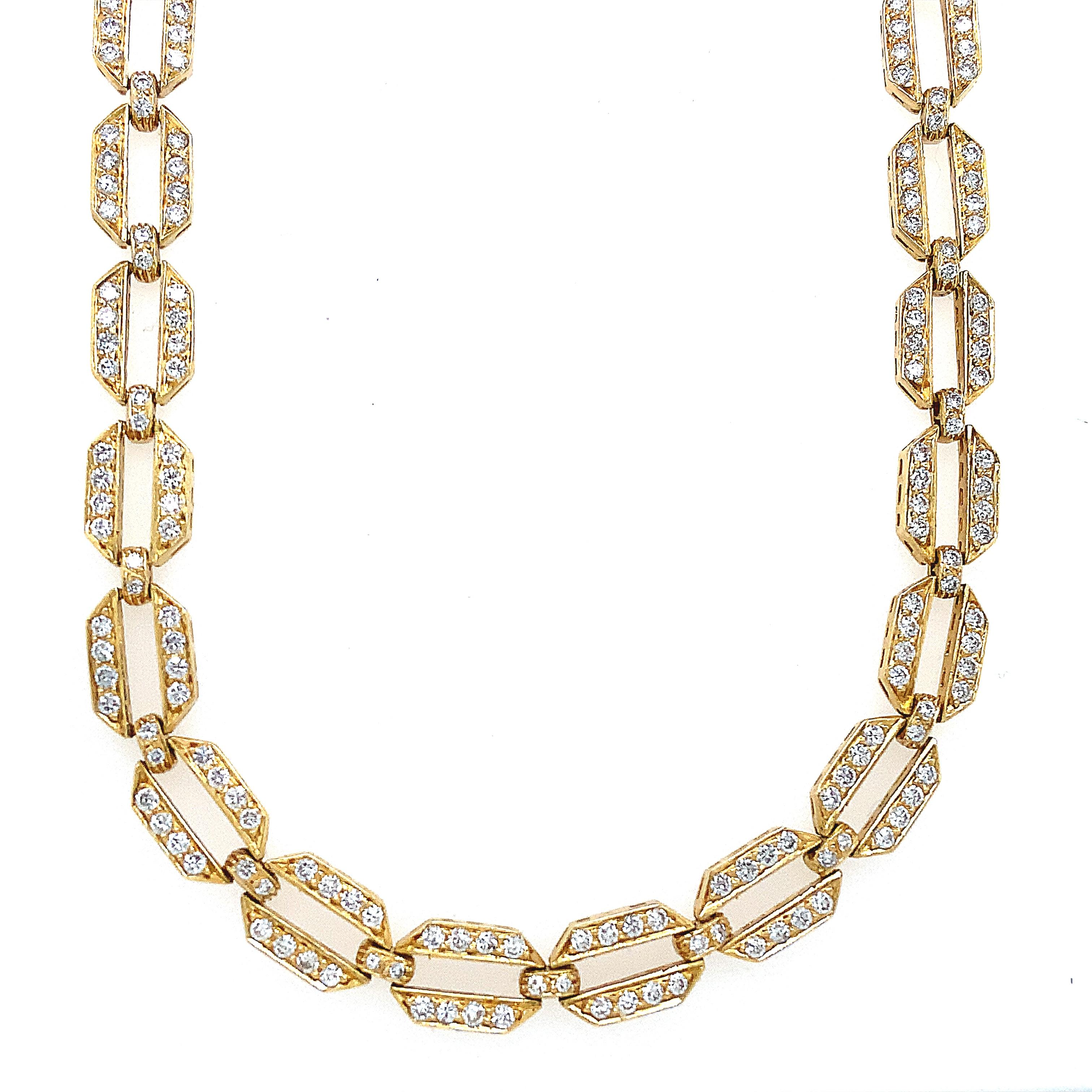 This one-of-a-kind Vintage necklace exhibits a 750 gold stamp and is crafted from yellow gold. It features a total of 51 links and 50 connections, all securely mitigated with a clasp. This exquisite sight is adorned with 512 round, brilliant-cut