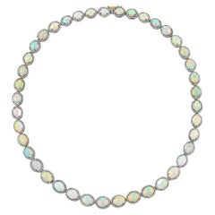 Important Opal Necklace Set with Diamonds 60 Carats Total