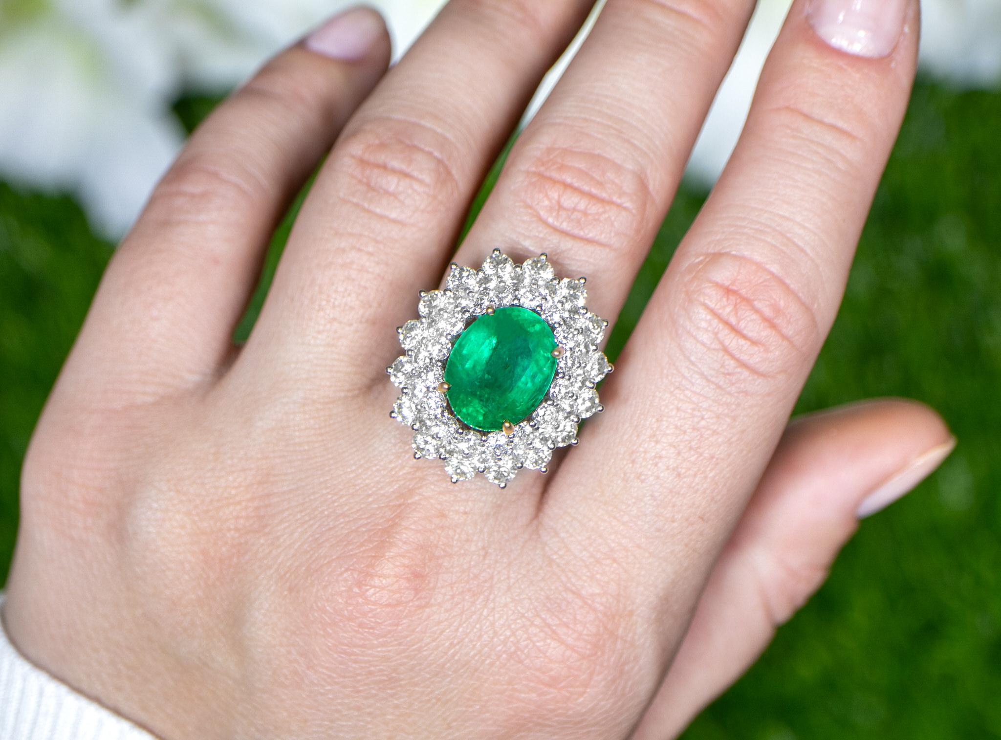 Oval Cut Important Oval Emerald Ring With Diamond Double Halo 12 Carats 18K Gold For Sale