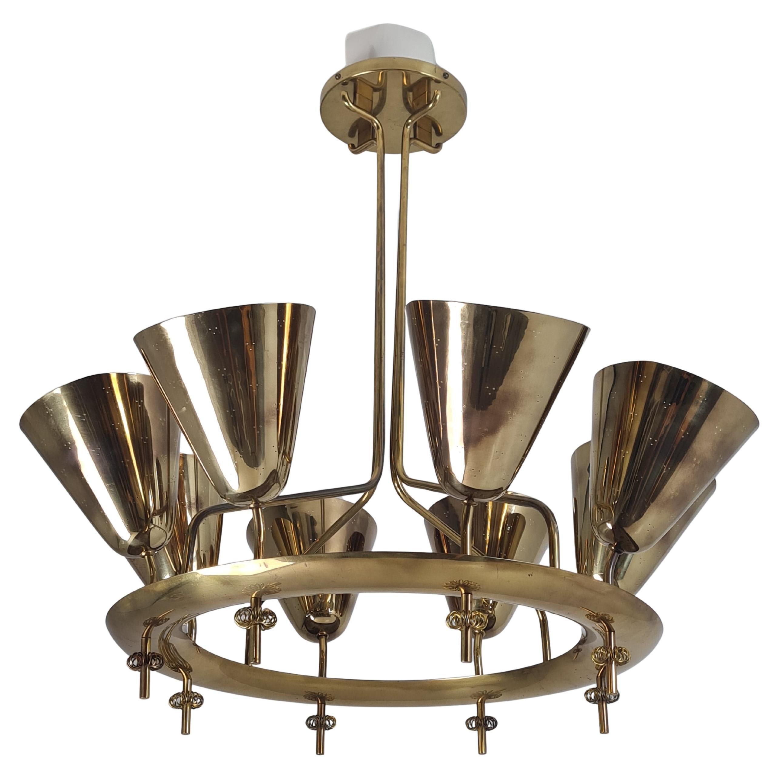 Important Paavo Tynell Chandelier Model 9062 in Perfortated Brass, Taito 1950s For Sale