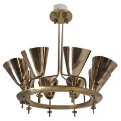 Important lustre Paavo Tynell modèle 9062 en laiton perforé, Taito années 1950